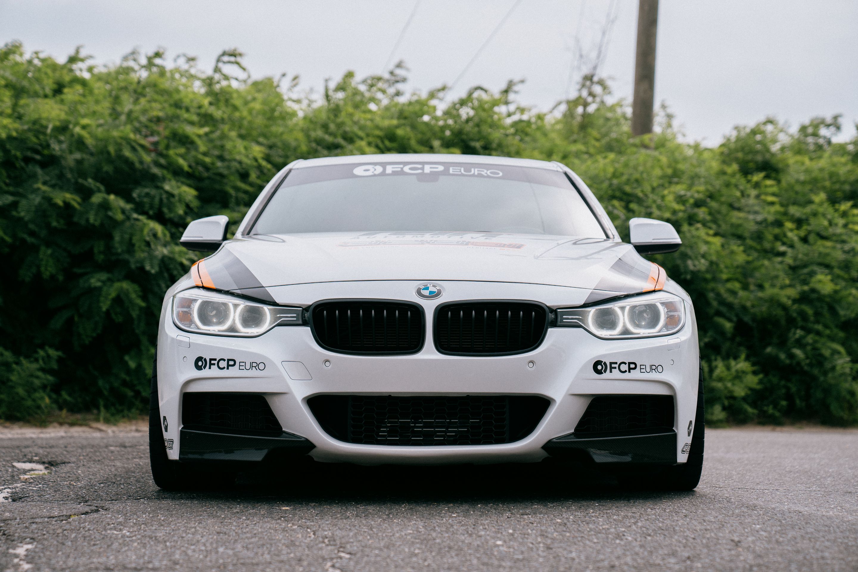 White BMW F30 Sedan 3 Series with 18" SM-10 Apex wheels in Race Silver