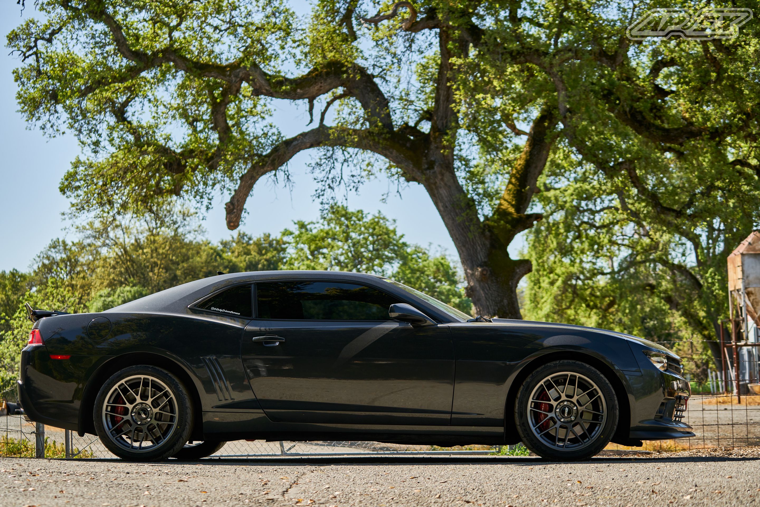 Grey Chevrolet 5th Gen Camaro RS with 19" ARC-8 Apex wheels in Anthracite
