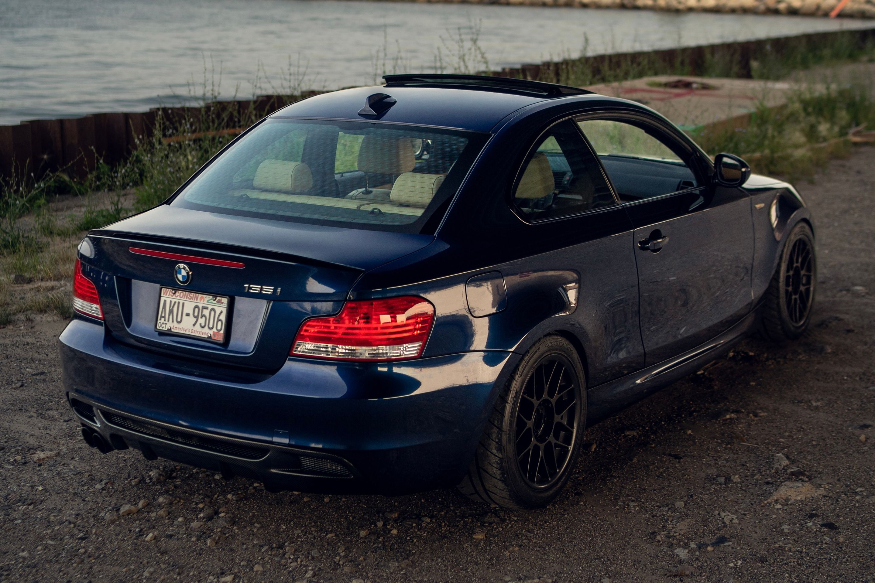 Blue BMW E82 Coupe 1 Series with 17" ARC-8 Apex wheels in Satin Black