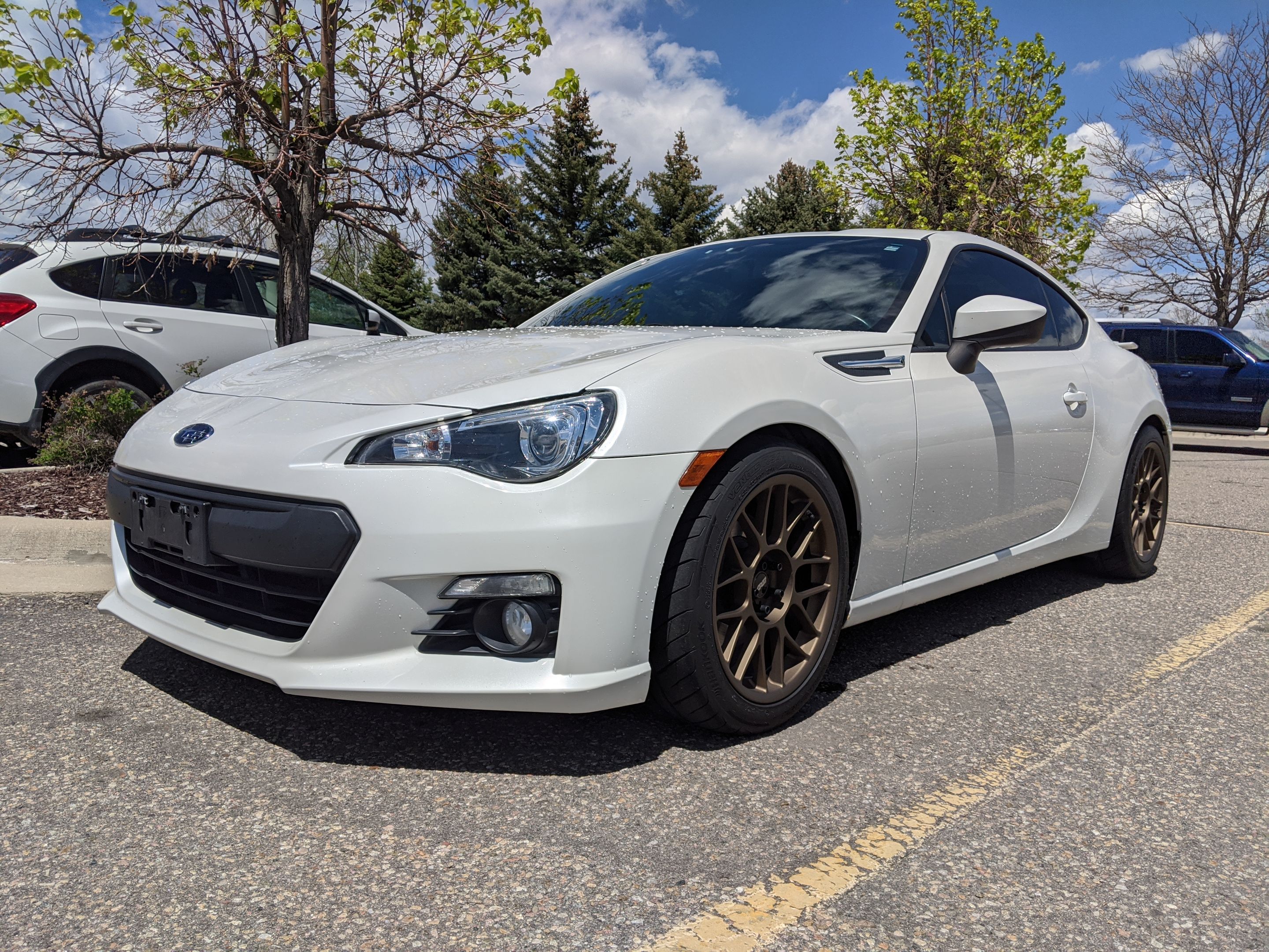 White Subaru ZC6 / Gen 1 BRZ with 17" ARC-8 Apex wheels in Satin Bronze