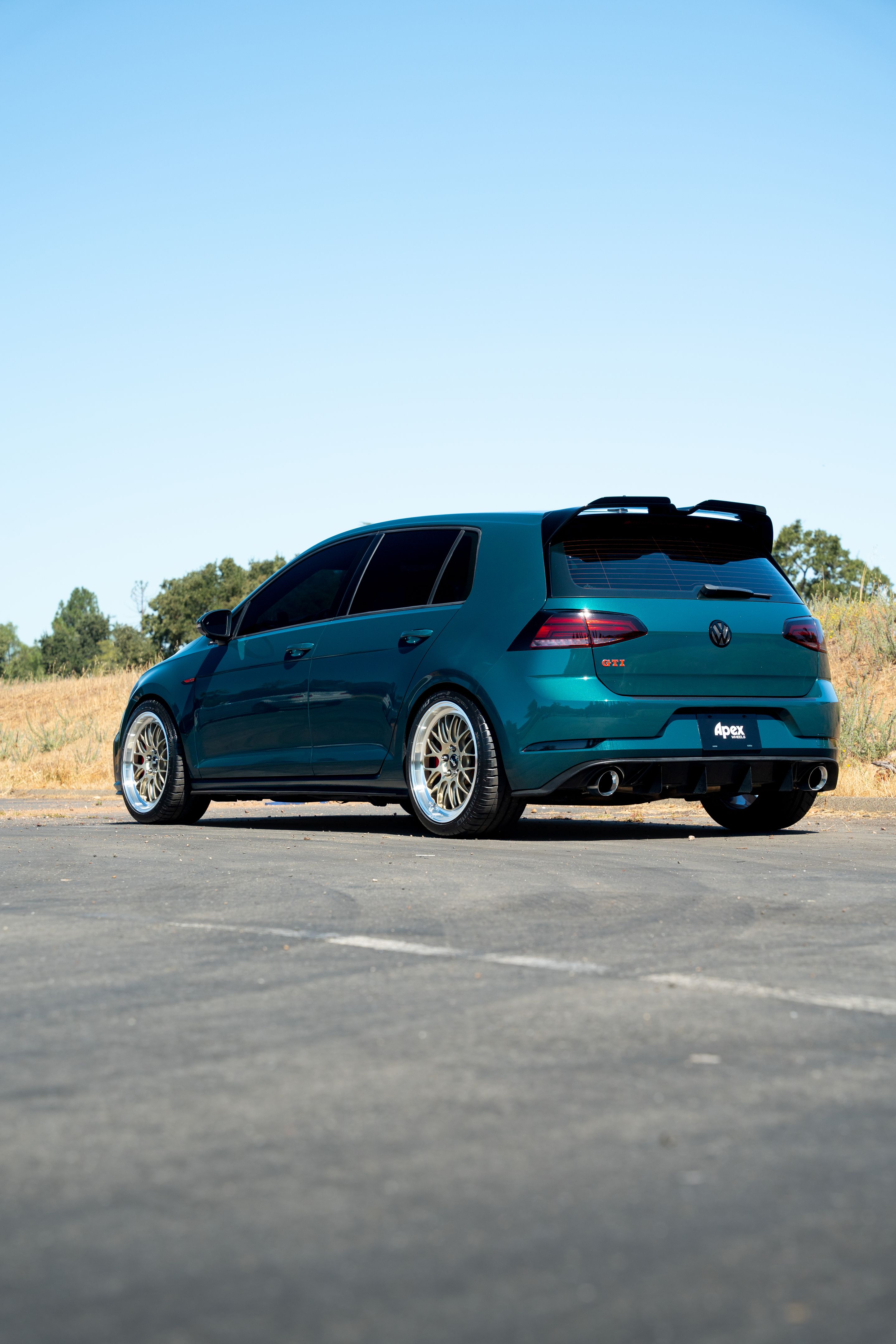 Green VW MK7 GTI with 18" ML-10RT Apex wheels in Machined Lip Gloss Motorsport Gold