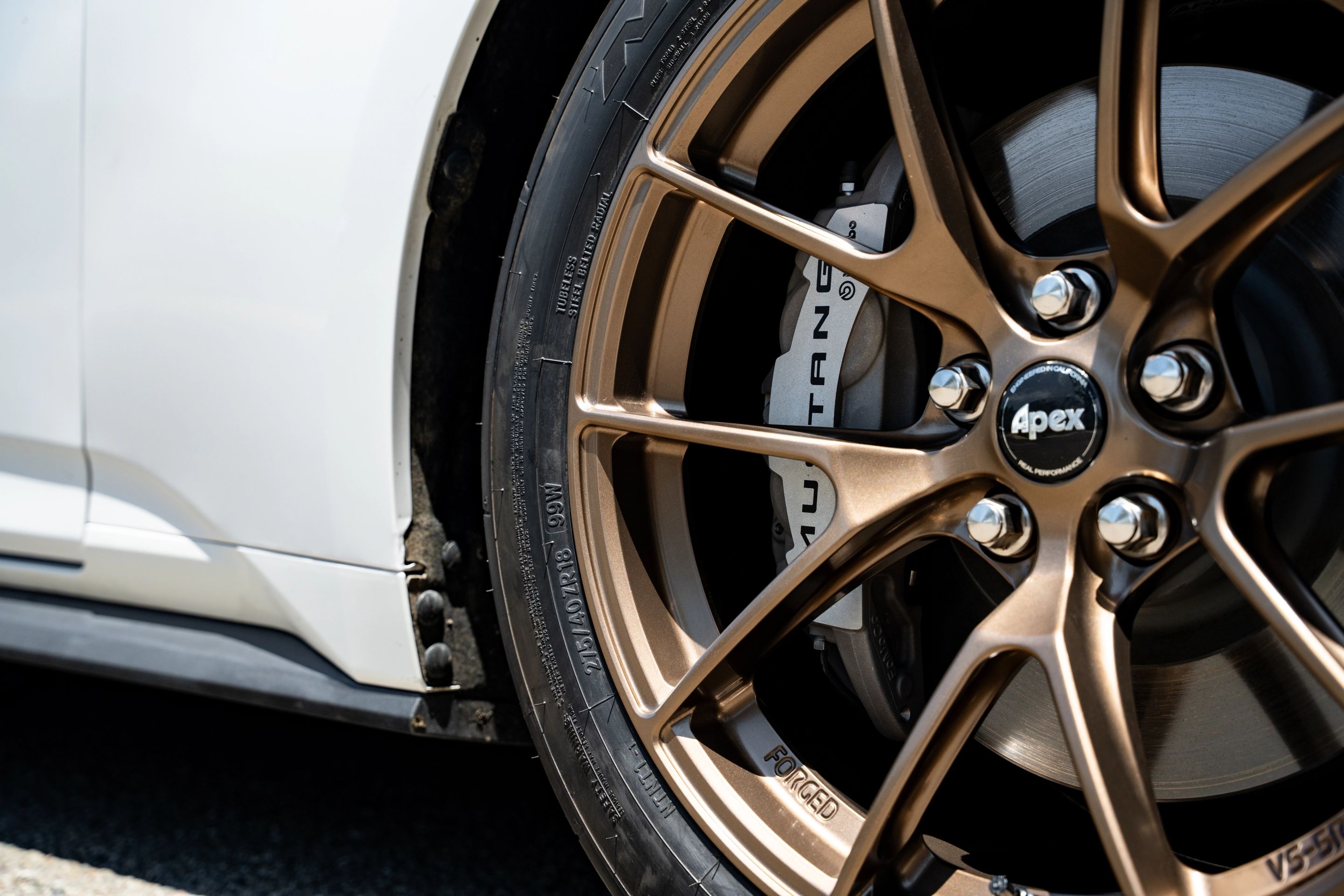 White Ford S650 Mustang GT with 18" VS-5RS Apex wheels in Satin Bronze