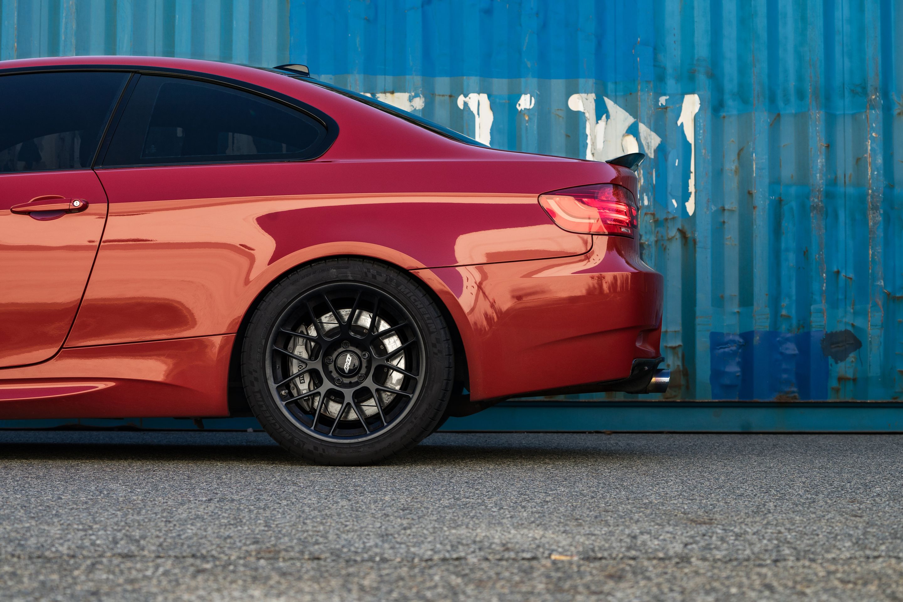 Red BMW E92 Coupe M3 with 18" ARC-8 Apex wheels in Satin Black