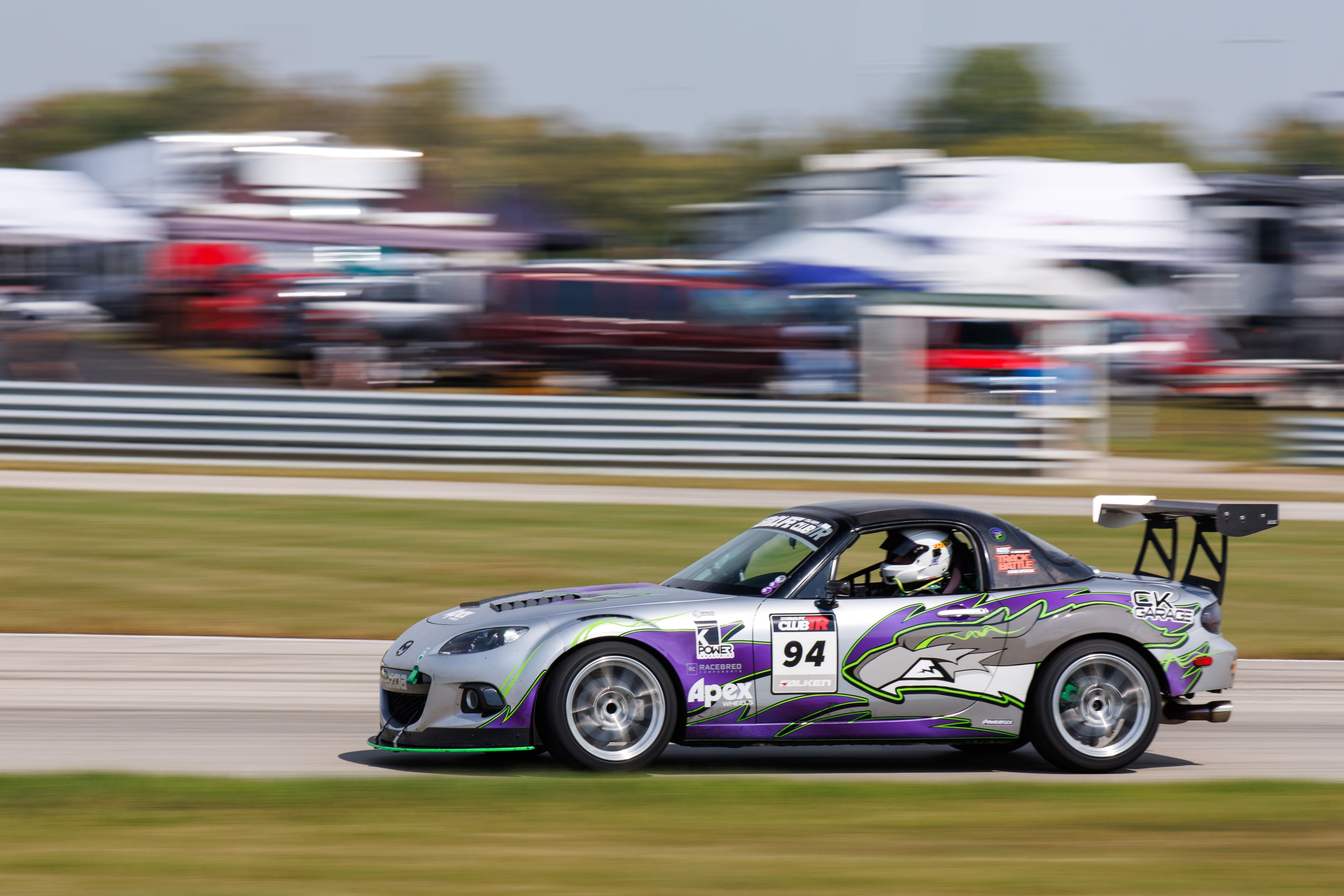 Silver Mazda NC MX-5 Miata with 17" VS-5RS Apex wheels in Brushed Clear