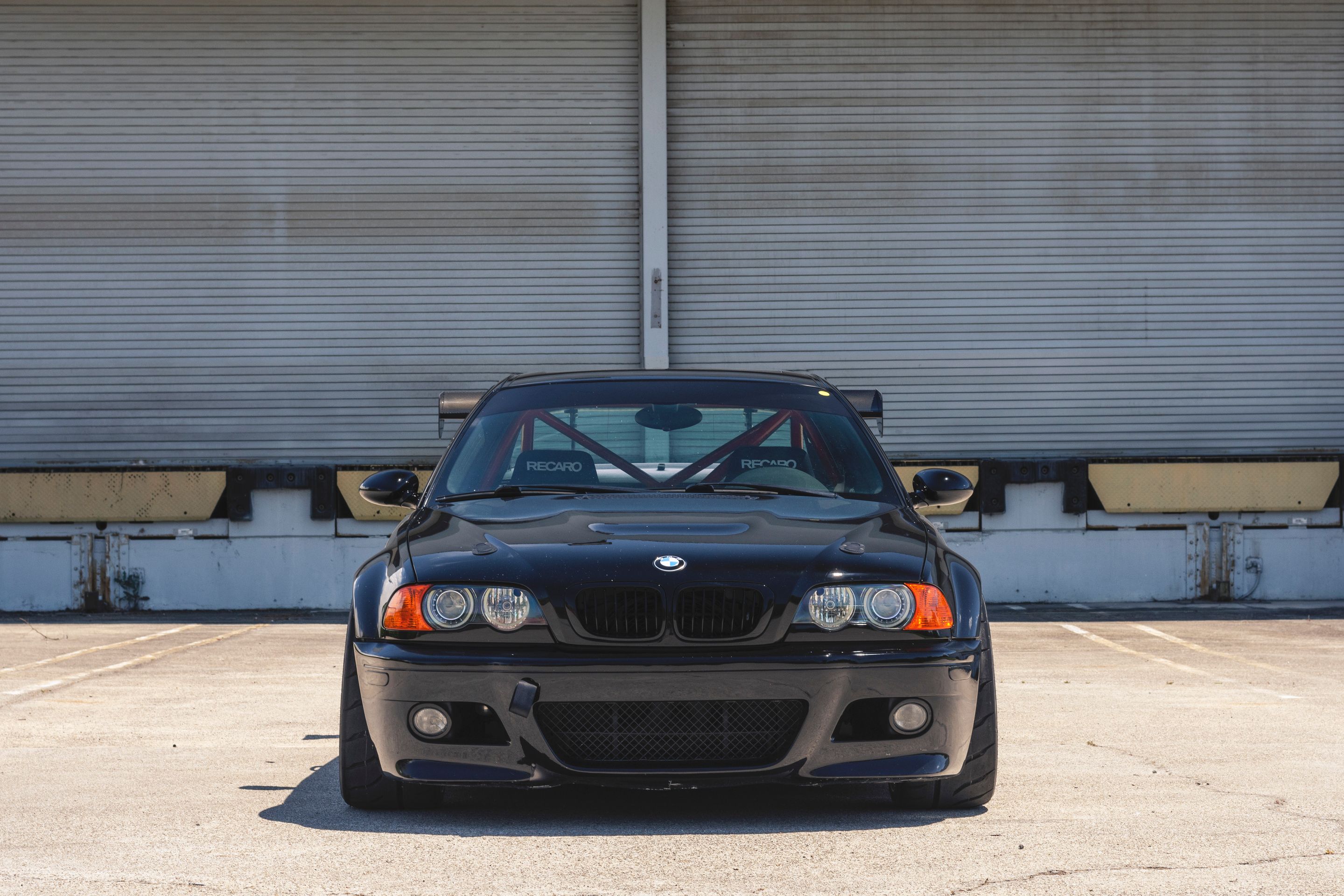 Black BMW E46 M3 with 18" EC-7R Apex wheels in Brushed Clear