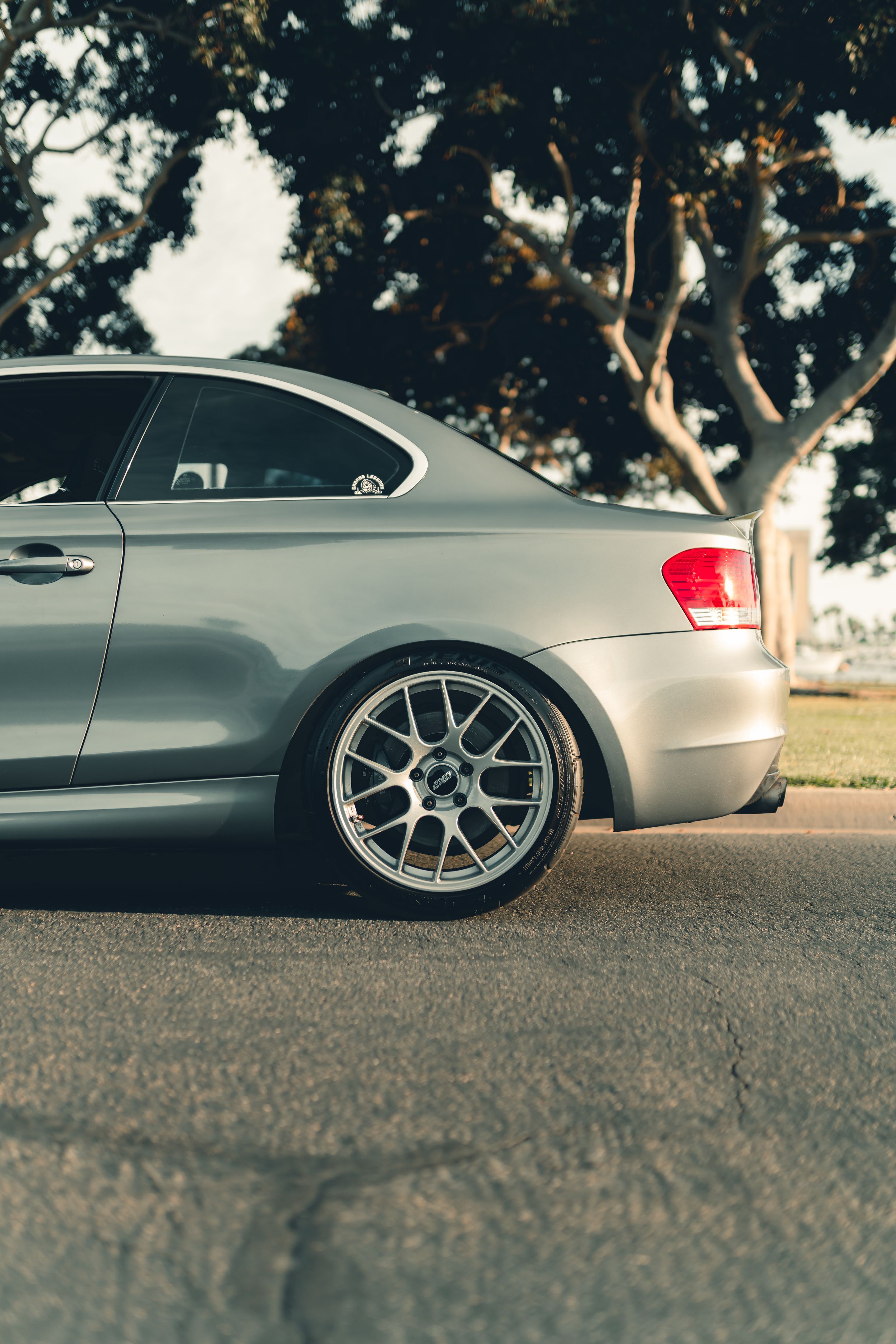 Grey BMW E82 Coupe 1 Series with 18" EC-7 Apex wheels in Race Silver