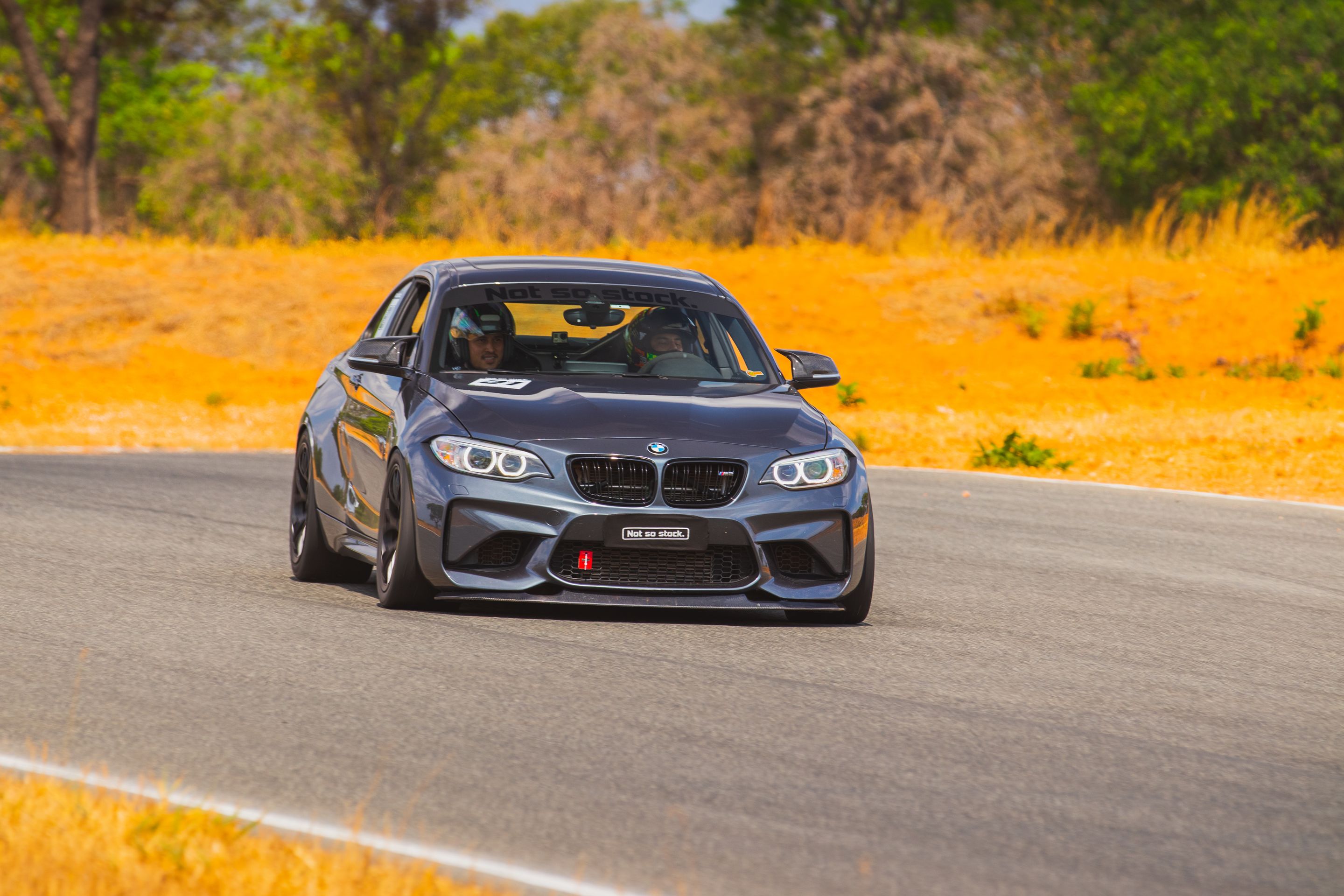Black BMW F87 M2 with 18" EC-7 Apex wheels in Satin Black