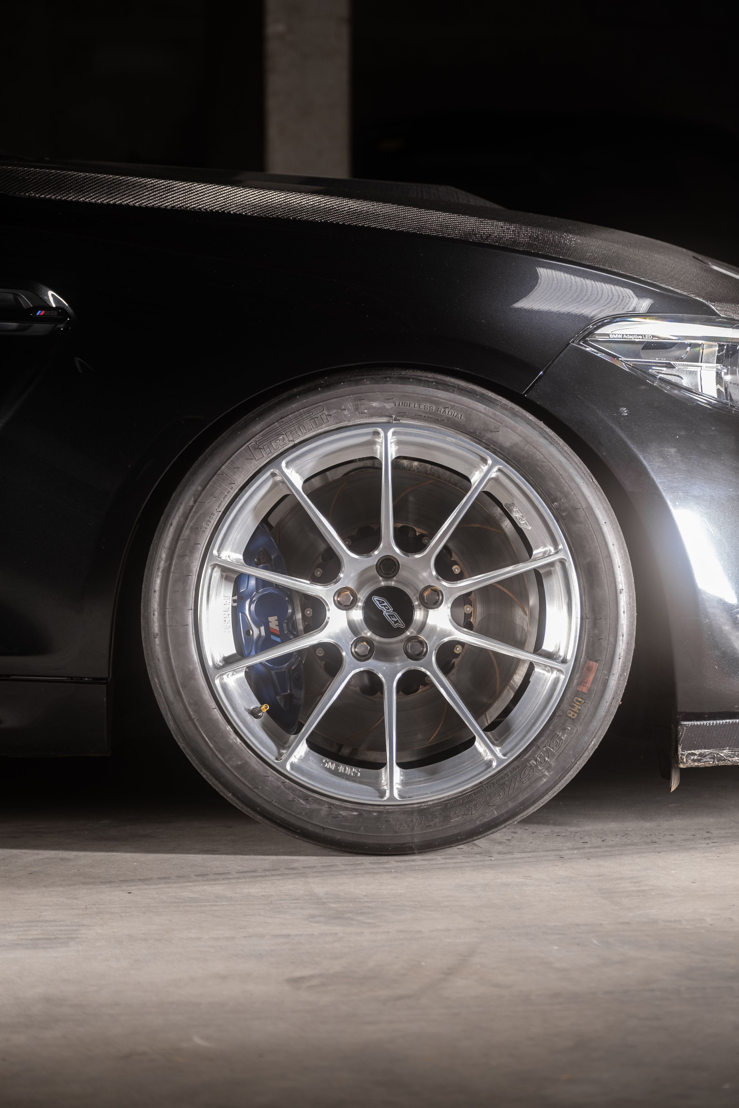 Black BMW F87 M2 with 18" SM-10RS Apex wheels in Brushed Clear