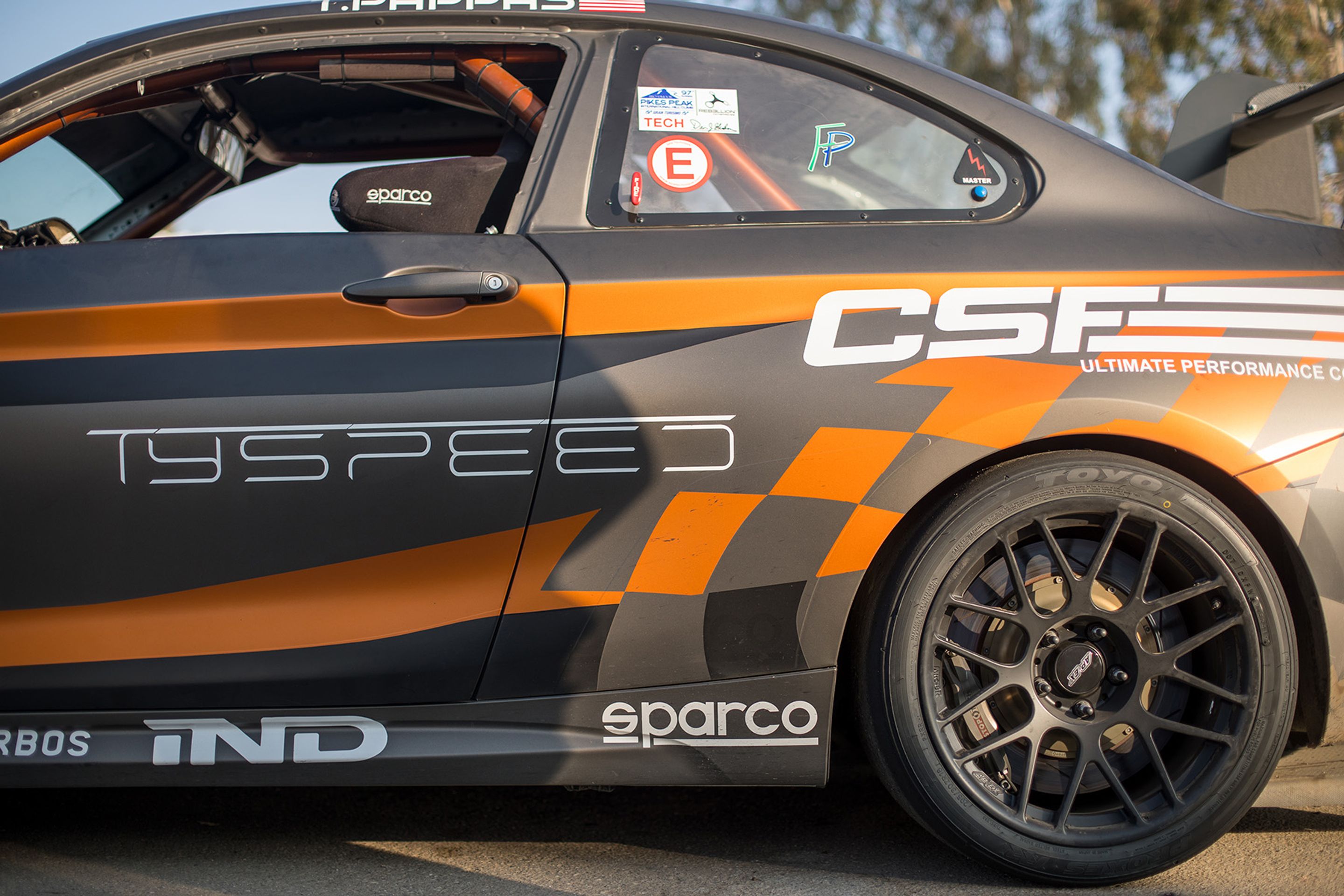 Multicolor BMW F87 M2 with 18" ARC-8R Apex wheels in Satin Black