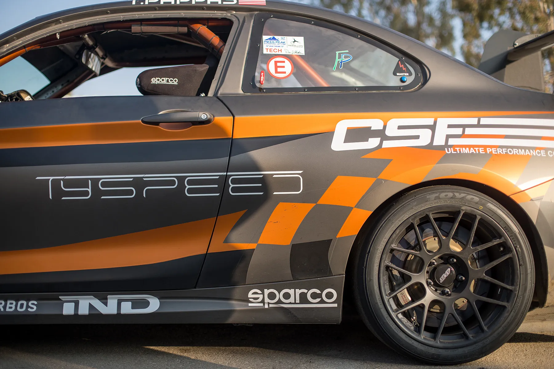 Multicolor BMW F87 M2 with 18" ARC-8R Apex wheels in Satin Black