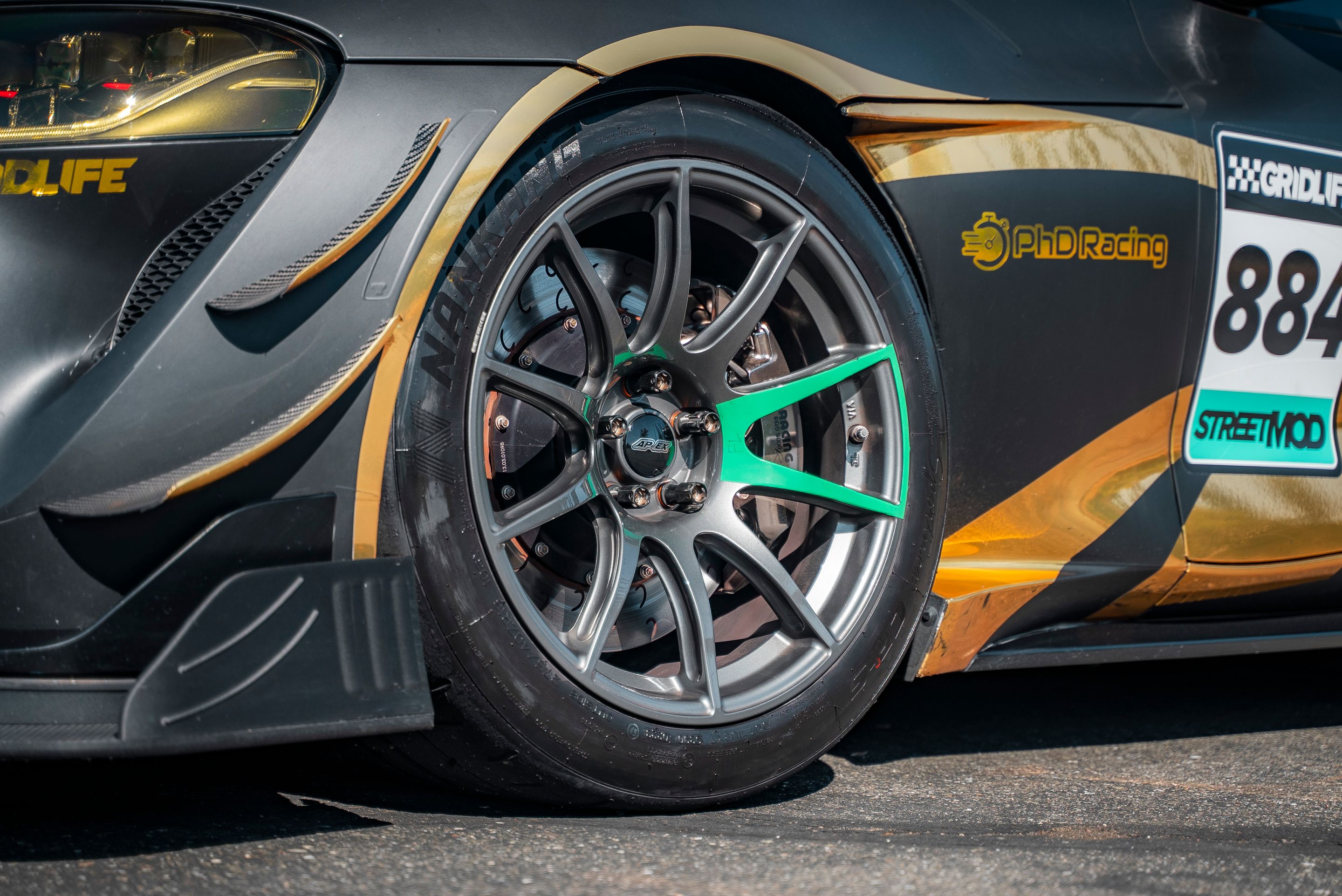 Grey Toyota GR Supra with 18" SM-10 Apex wheels in Anthracite