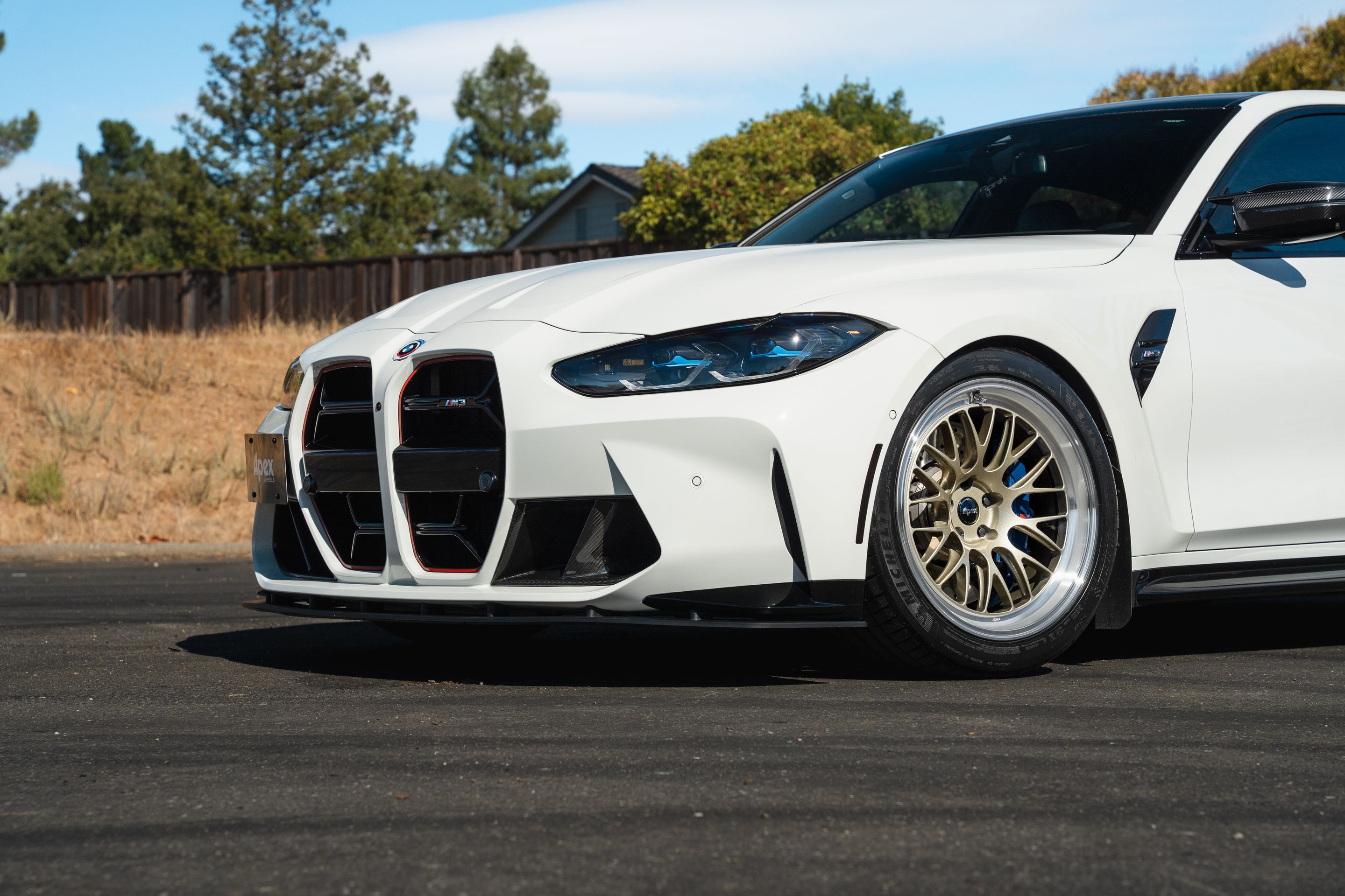 White BMW G80 M3 with 19" ML-10RT Apex wheels in Machined Lip Gloss Motorsport Gold