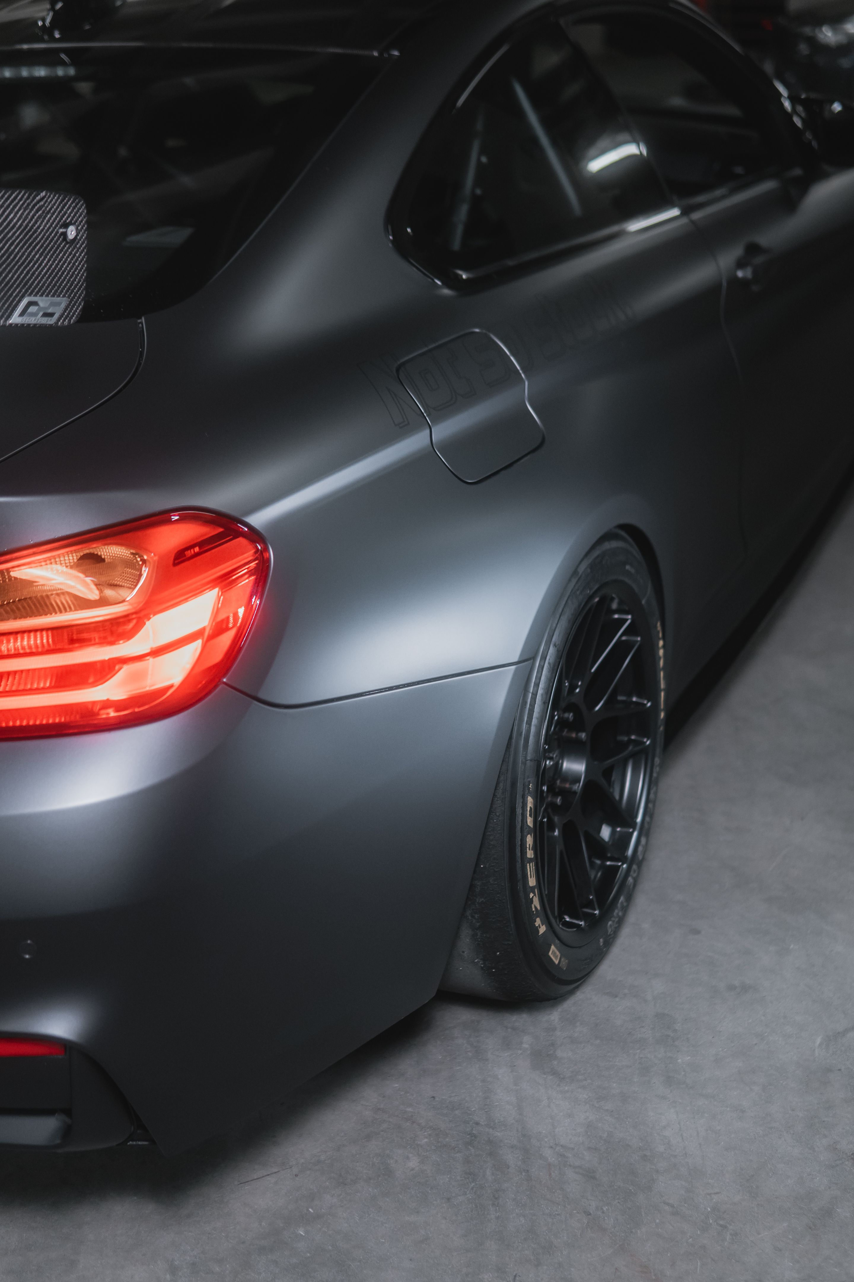 Black BMW F82 Coupe M4 with 18" ARC-8 Apex wheels in Satin Black