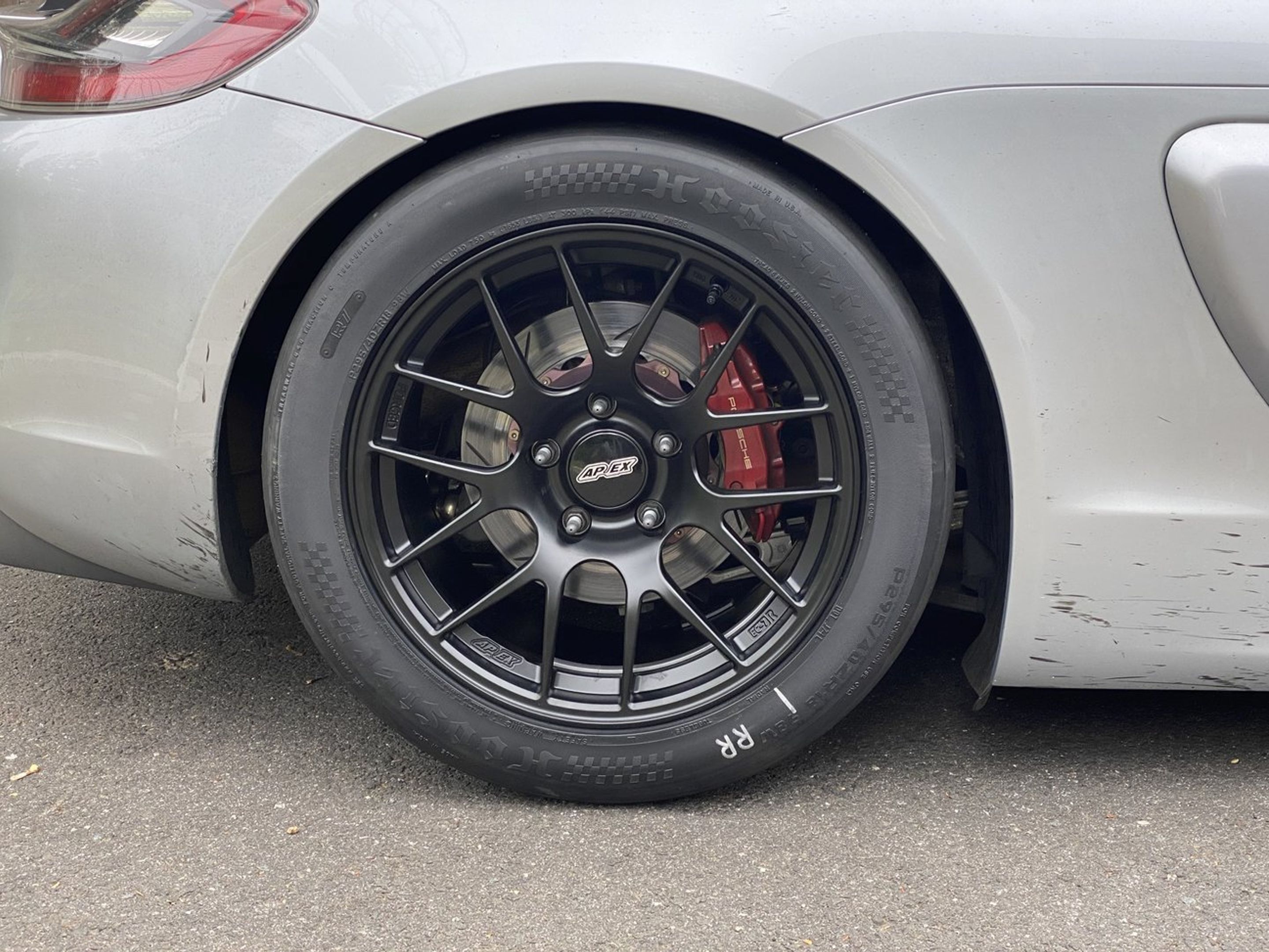Silver Porsche 981 Cayman S with 18" EC-7R Apex wheels in Satin Black