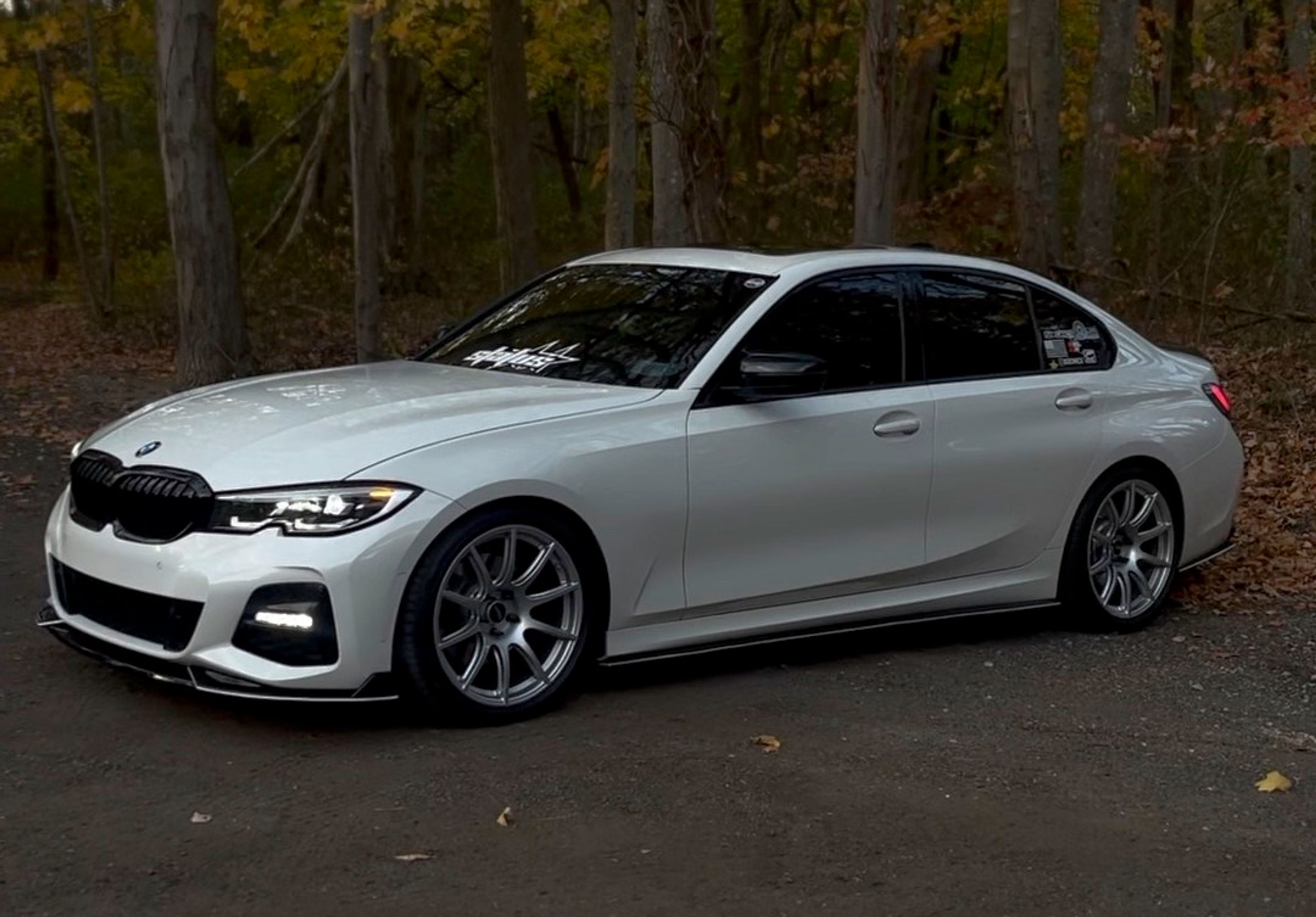 White BMW G20 Sedan 3 Series with 19" SM-10 Apex wheels in Race Silver