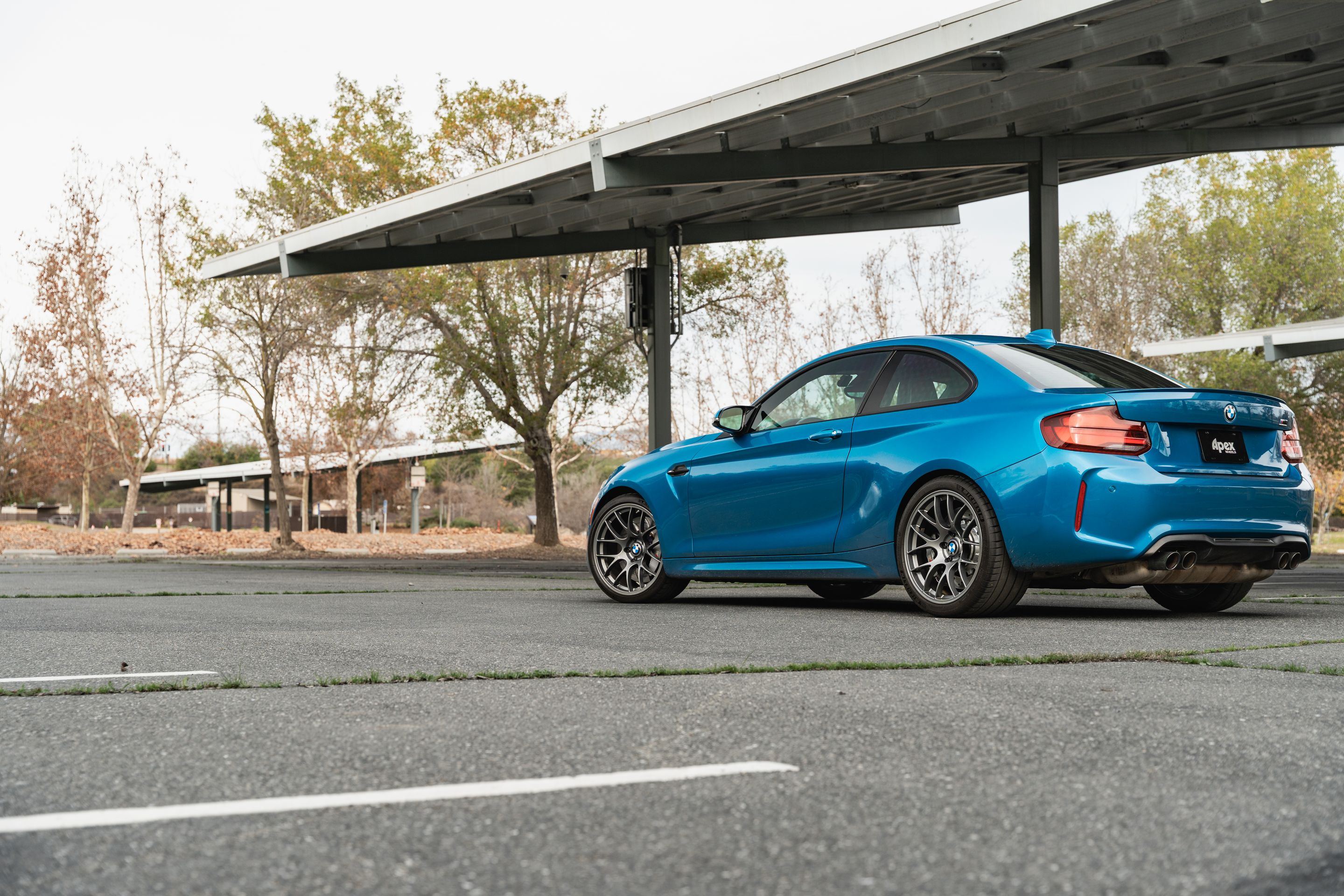 Blue BMW F87 M2 with 19" EC-7 Apex wheels in Anthracite