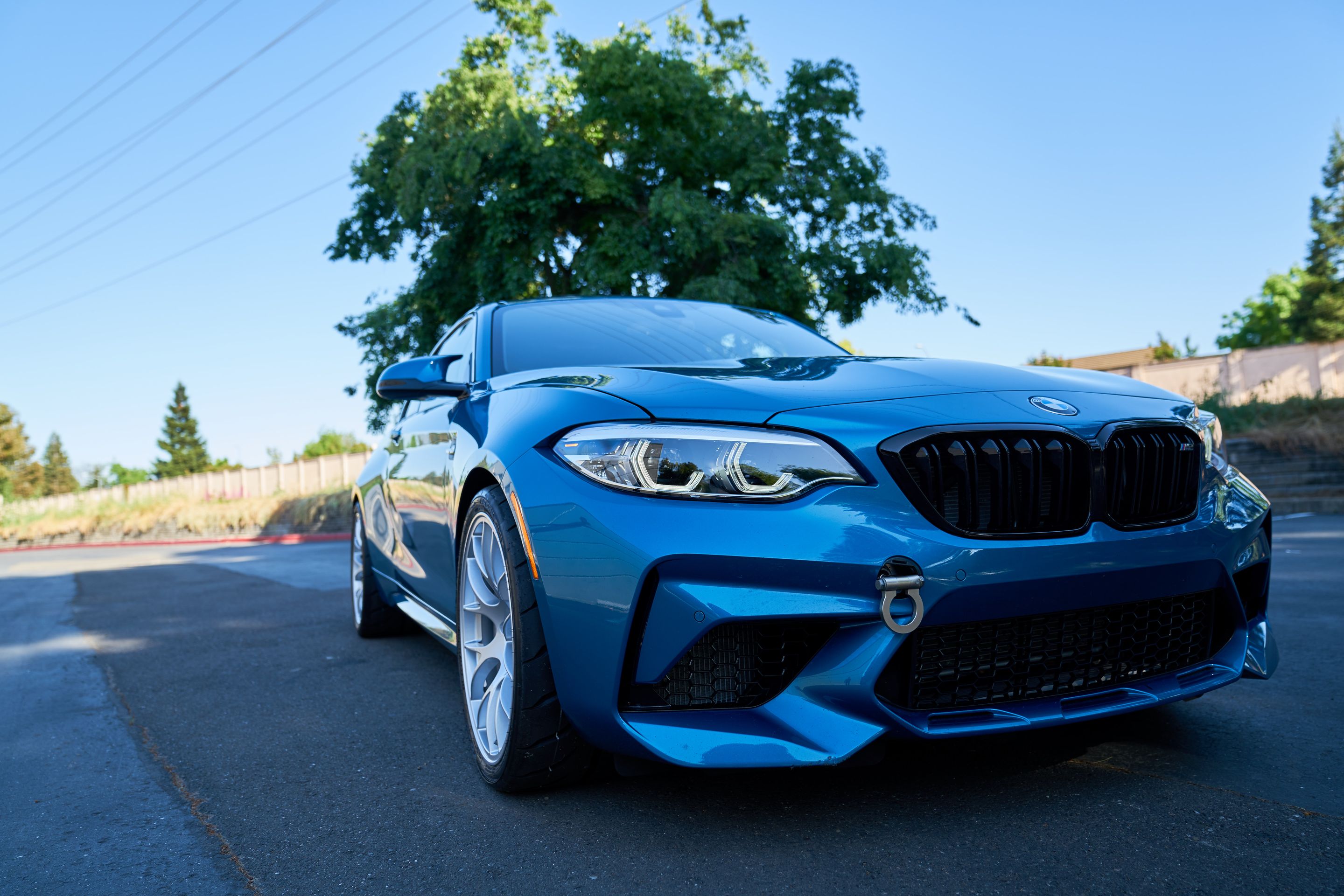 Blue BMW F87 M2 with 19" EC-7 Apex wheels in Race Silver