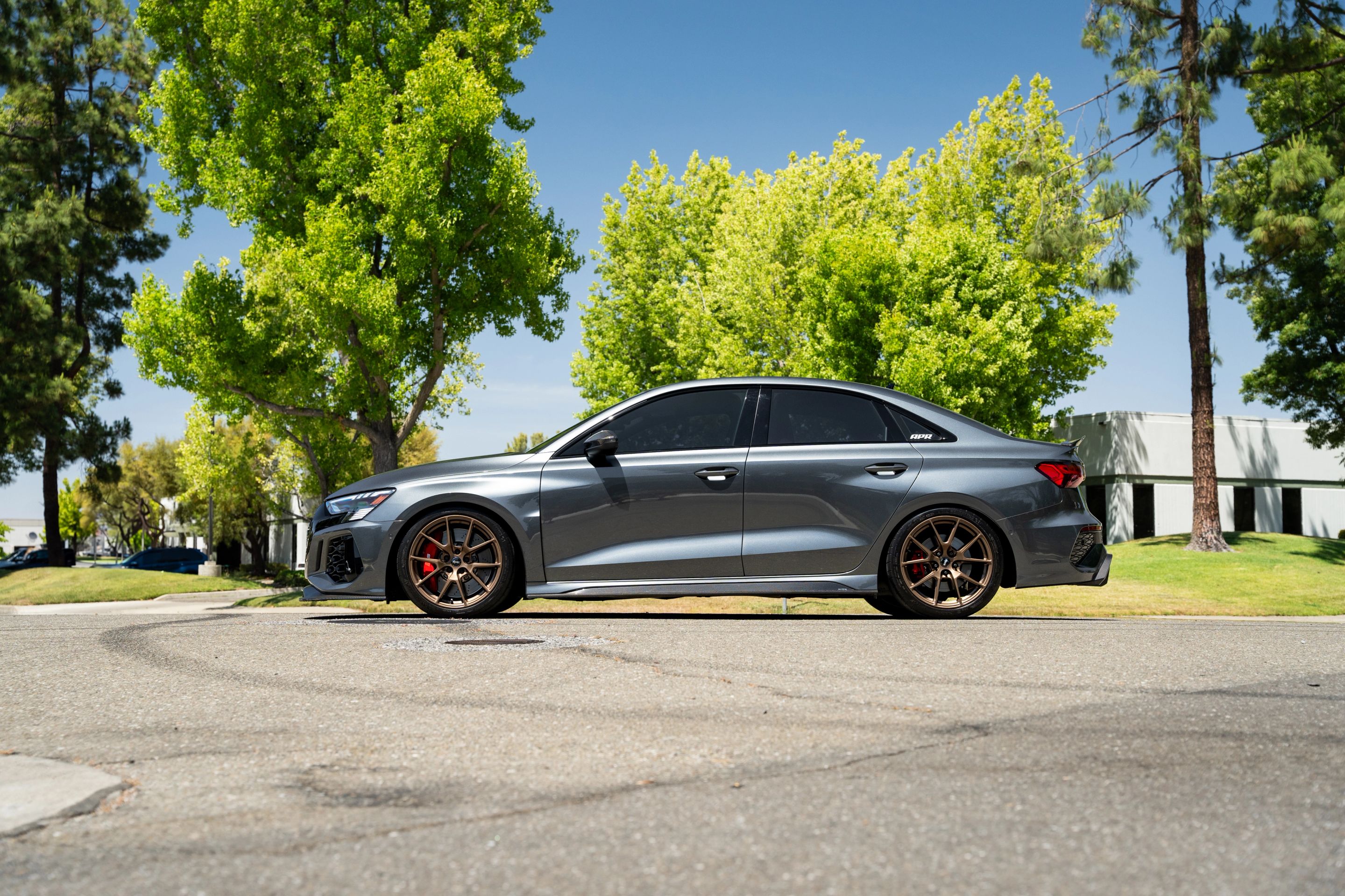 Grey Audi 8Y RS 3 with 18" VS-5 Apex wheels in Satin Bronze