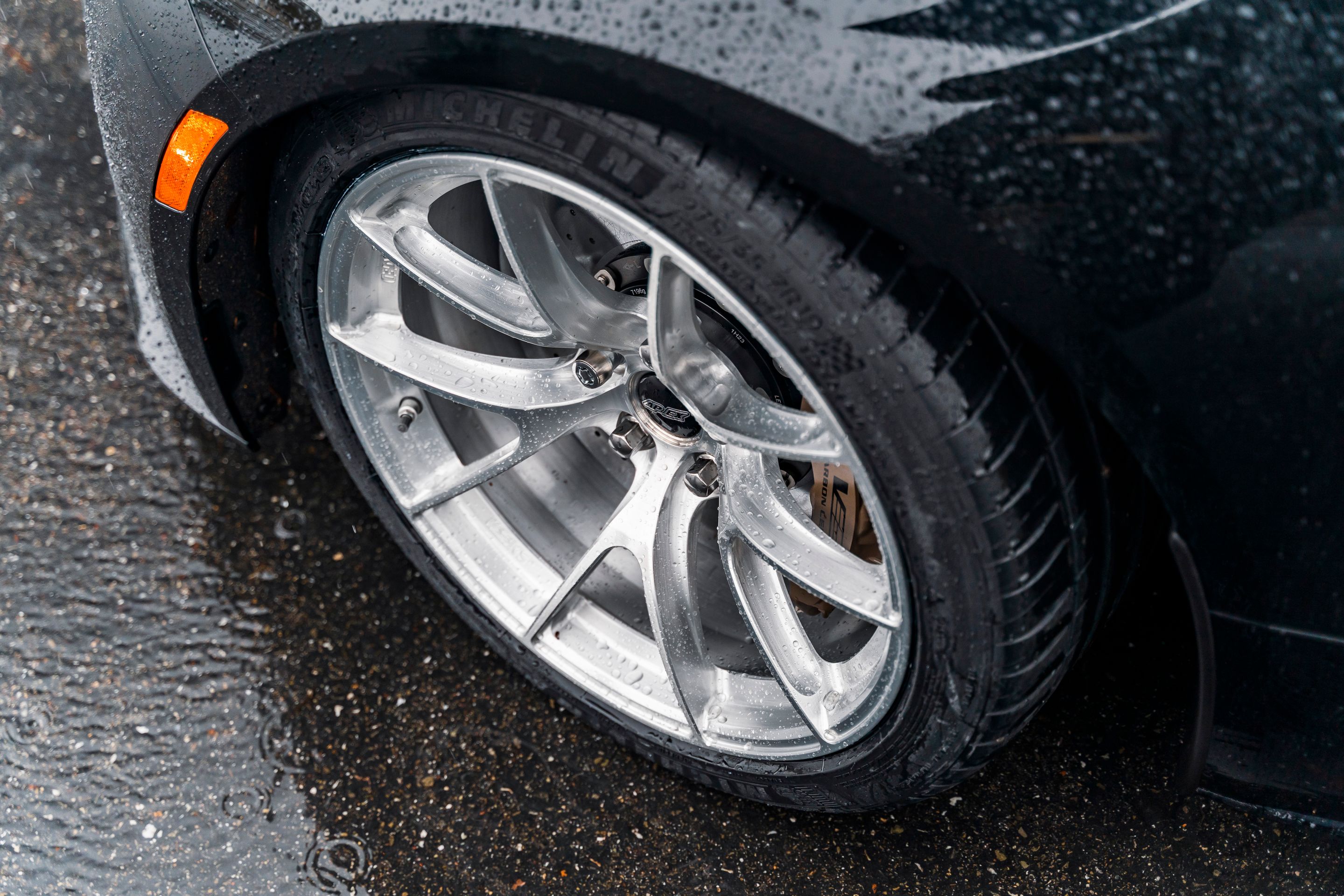 Black Cadillac CT5-V Blackwing with 19" VS-5RS Apex wheels in Brushed Clear