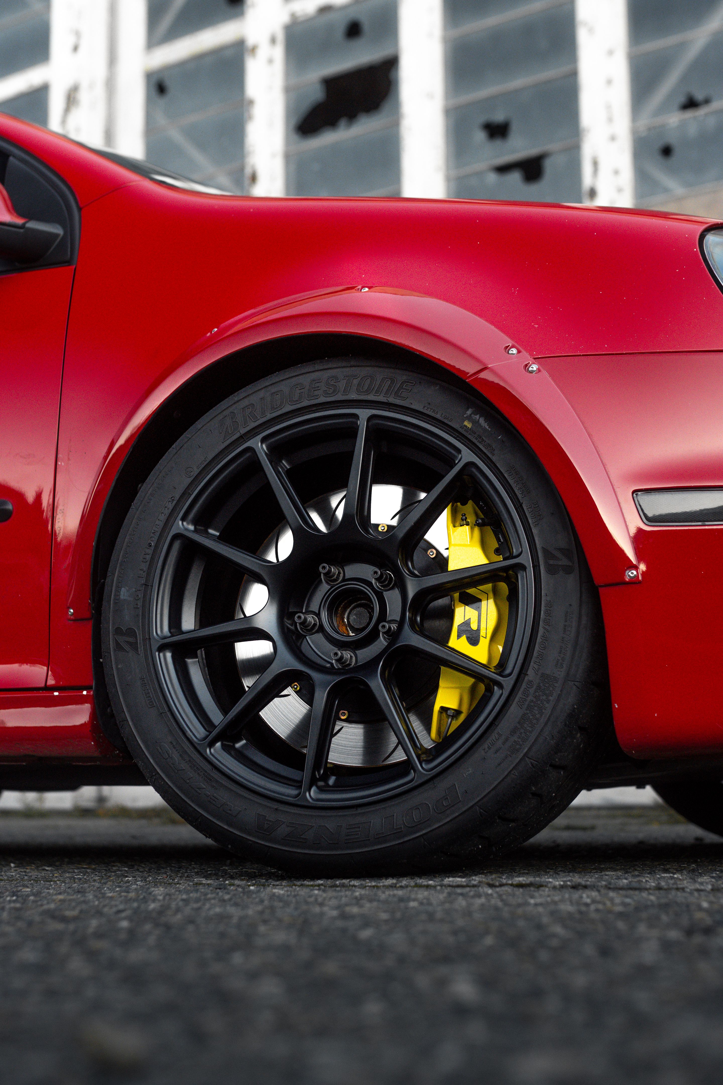 Red VW MK5 Golf with 17" SM-10 Apex wheels in Satin Black