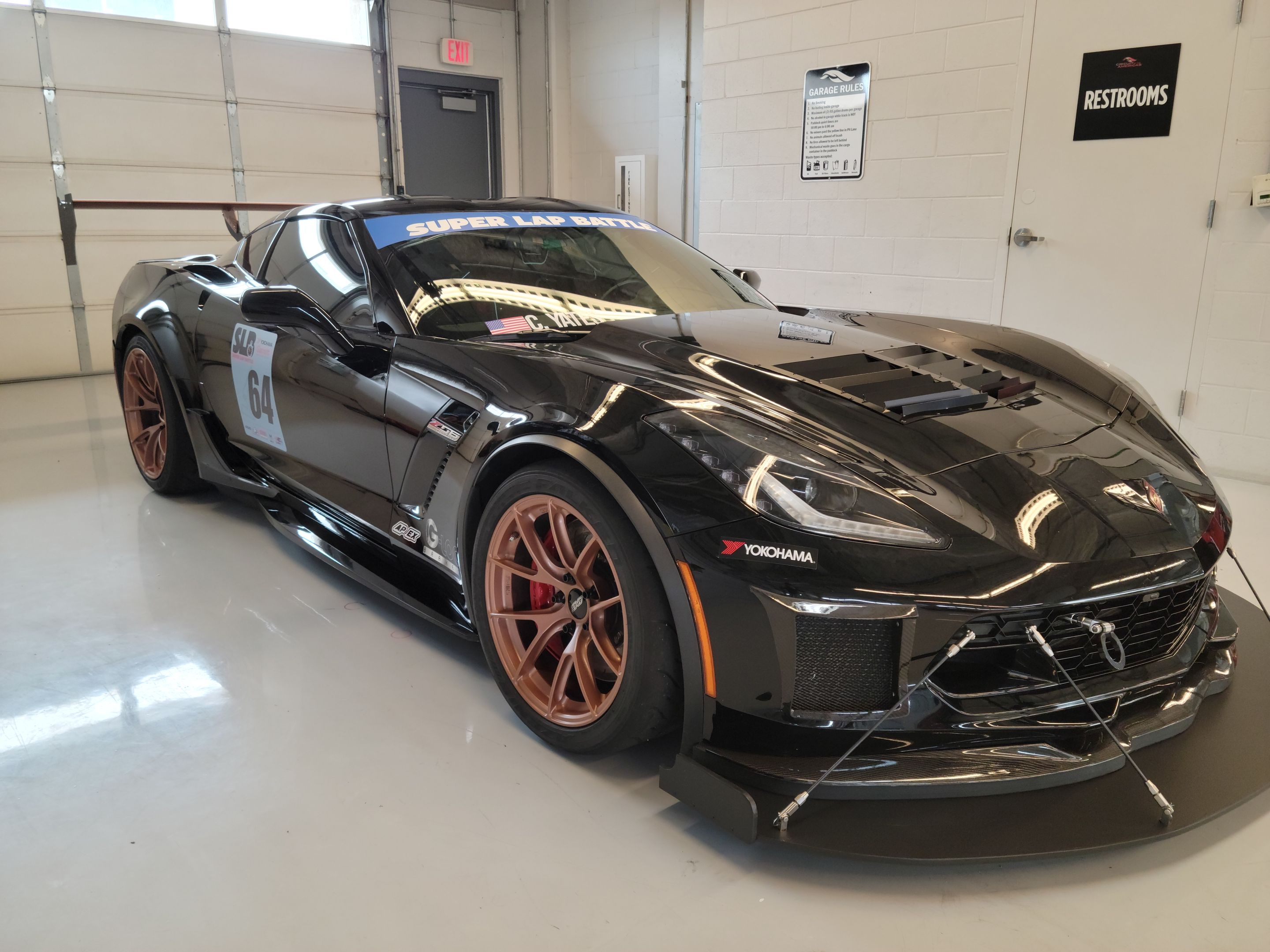 Black Chevrolet C7 Corvette Z06 with 18"/19" VS-5RS Apex wheels in Custom Finish
