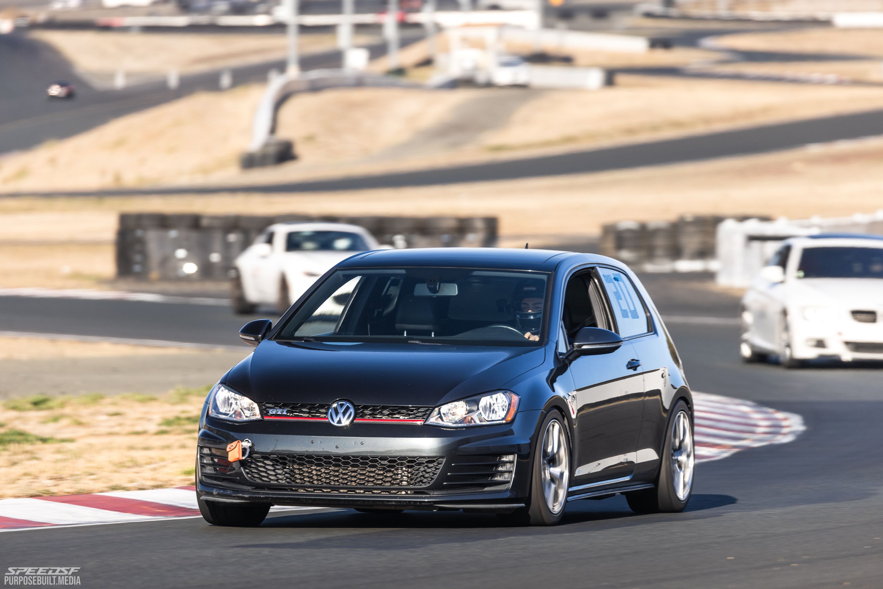 Grey VW MK7 GTI with 17" VS-5RS Apex wheels in Brushed Clear