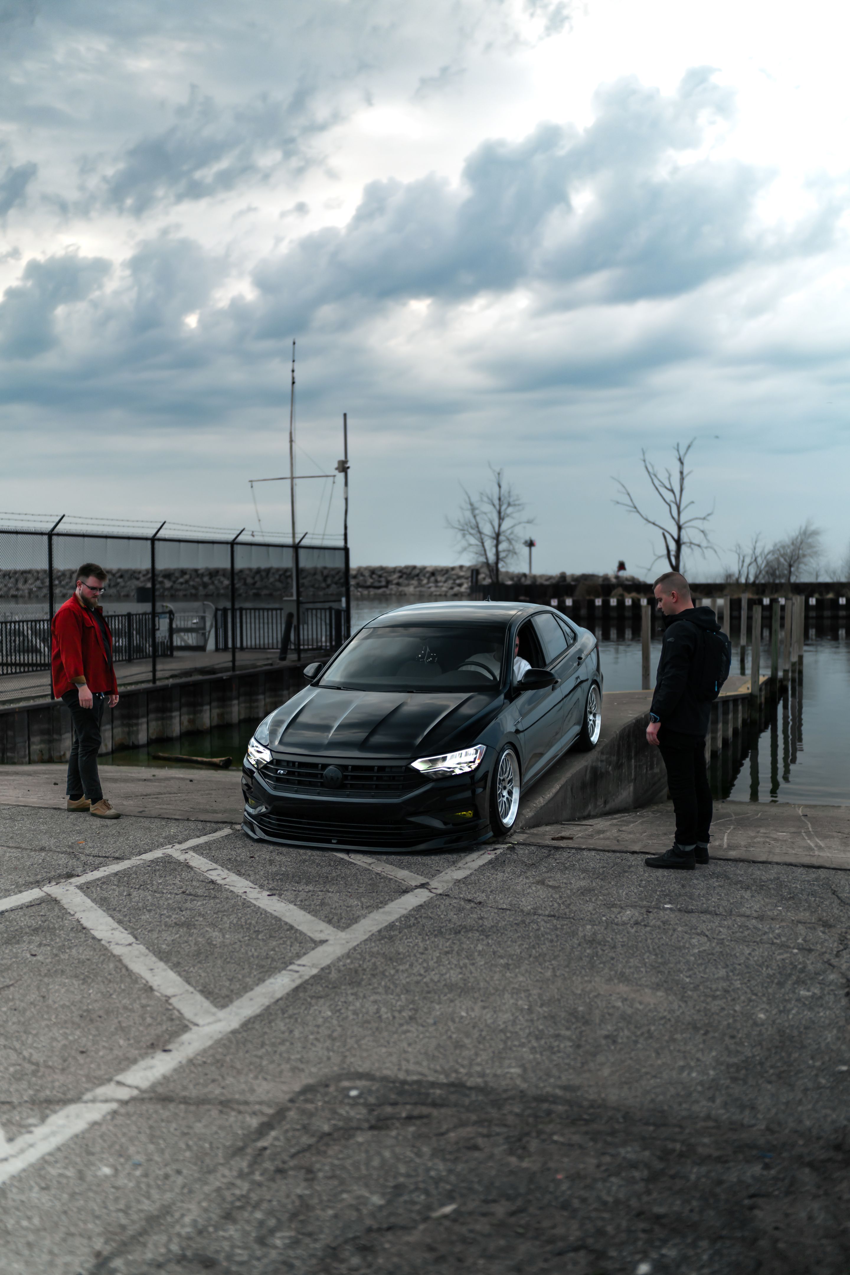 Black VW MK7 Jetta with 19" ML-10RT Apex wheels in Machined Lip Race Silver