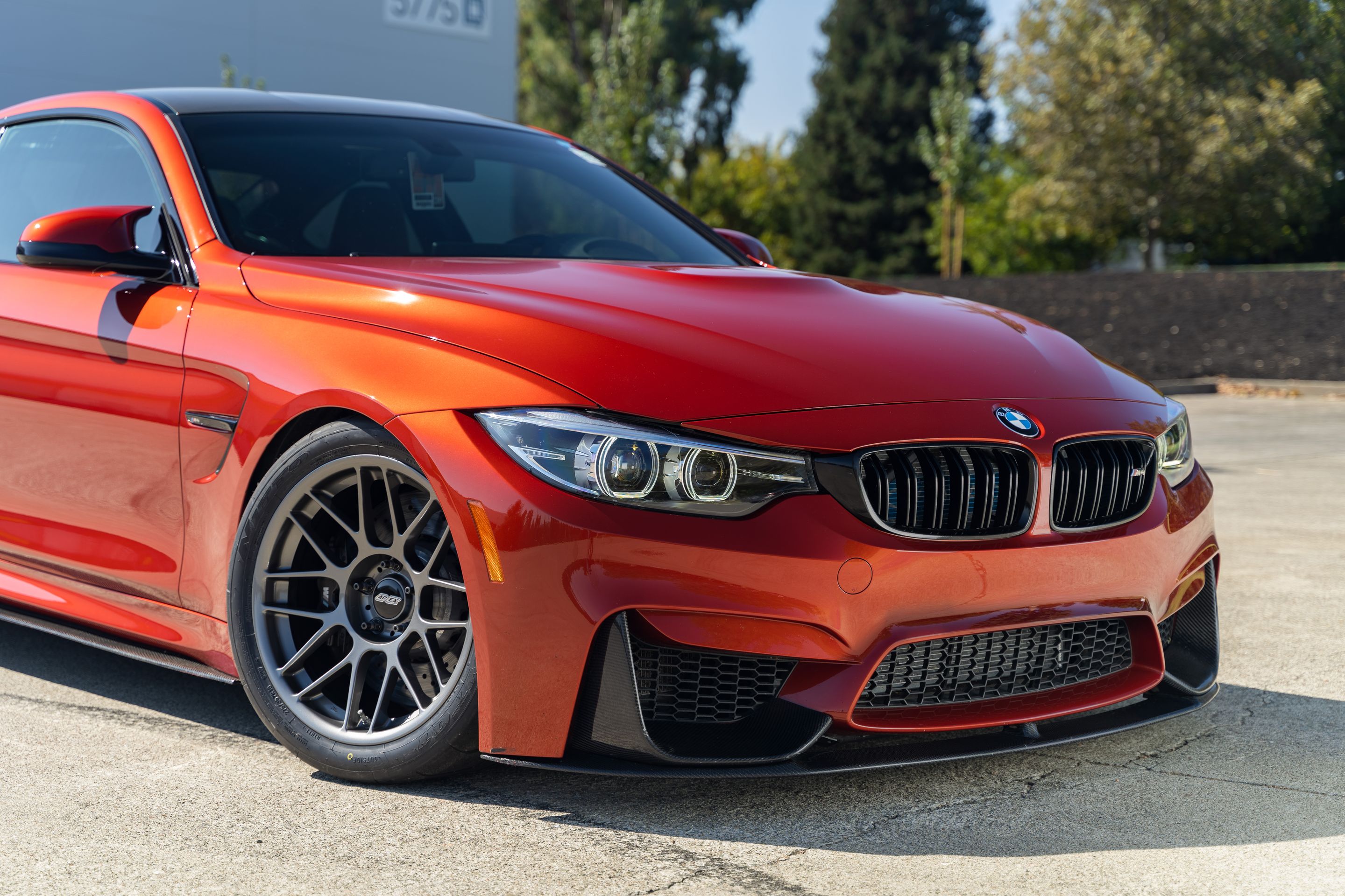 Orange BMW F82 Coupe M4 with 18" ARC-8 Apex wheels in Anthracite