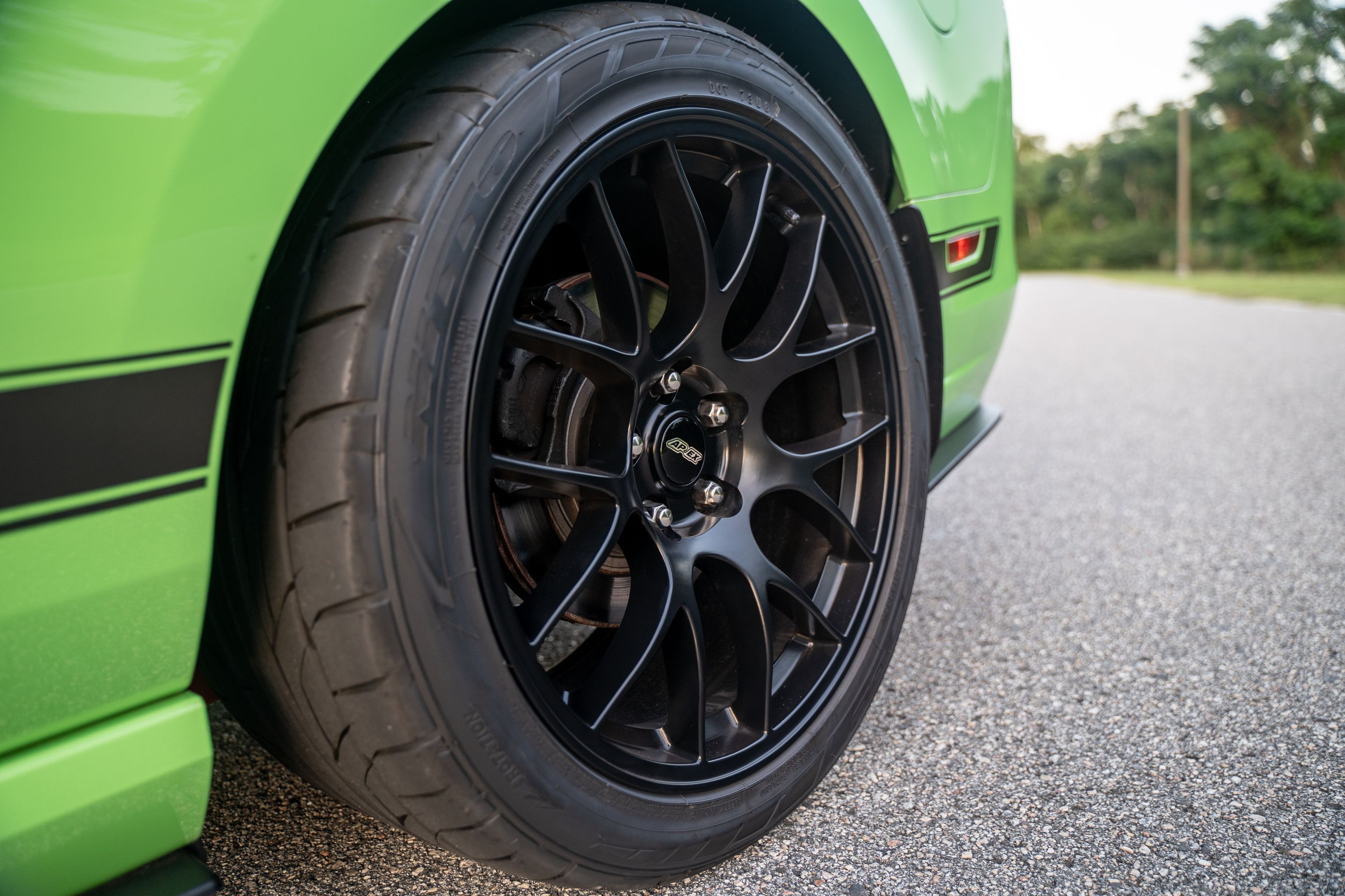 Green Ford S197 Mustang Boss 302 with 19" EC-7 Apex wheels in Satin Black