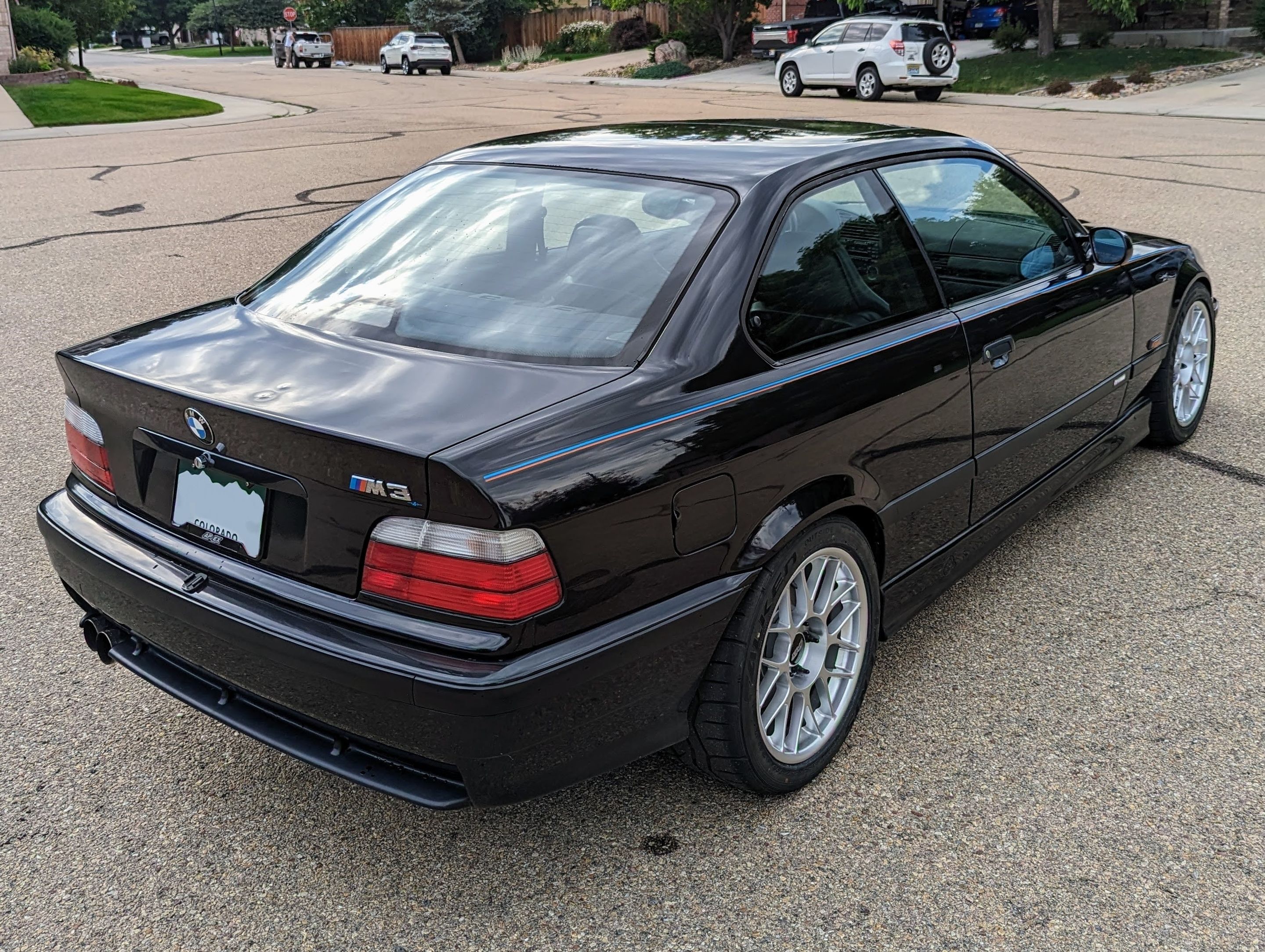 Black BMW E36 M3 with 17" ARC-8 Apex wheels in Hyper Silver