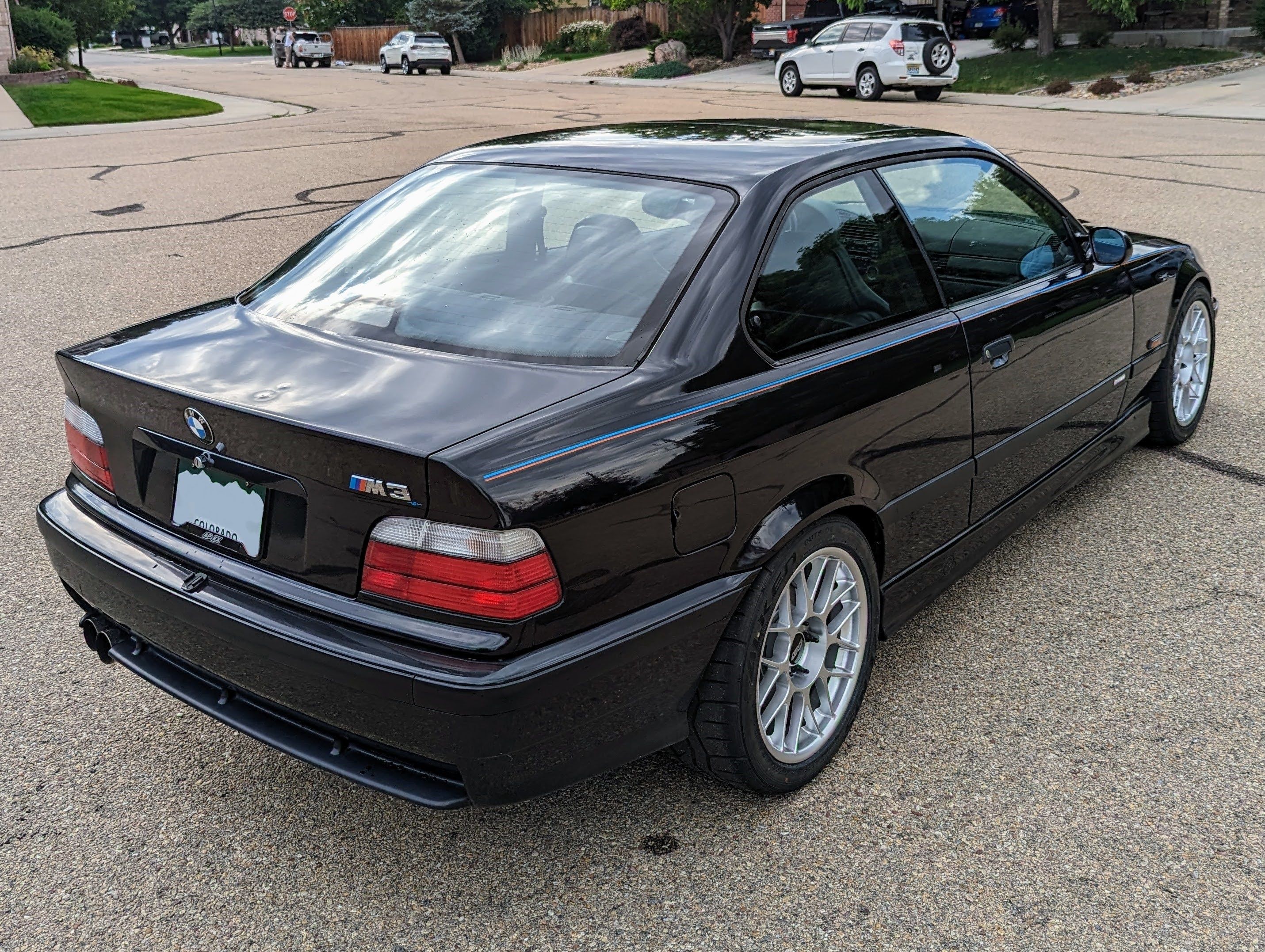 Black BMW E36 M3 with 17" ARC-8 Apex wheels in Hyper Silver