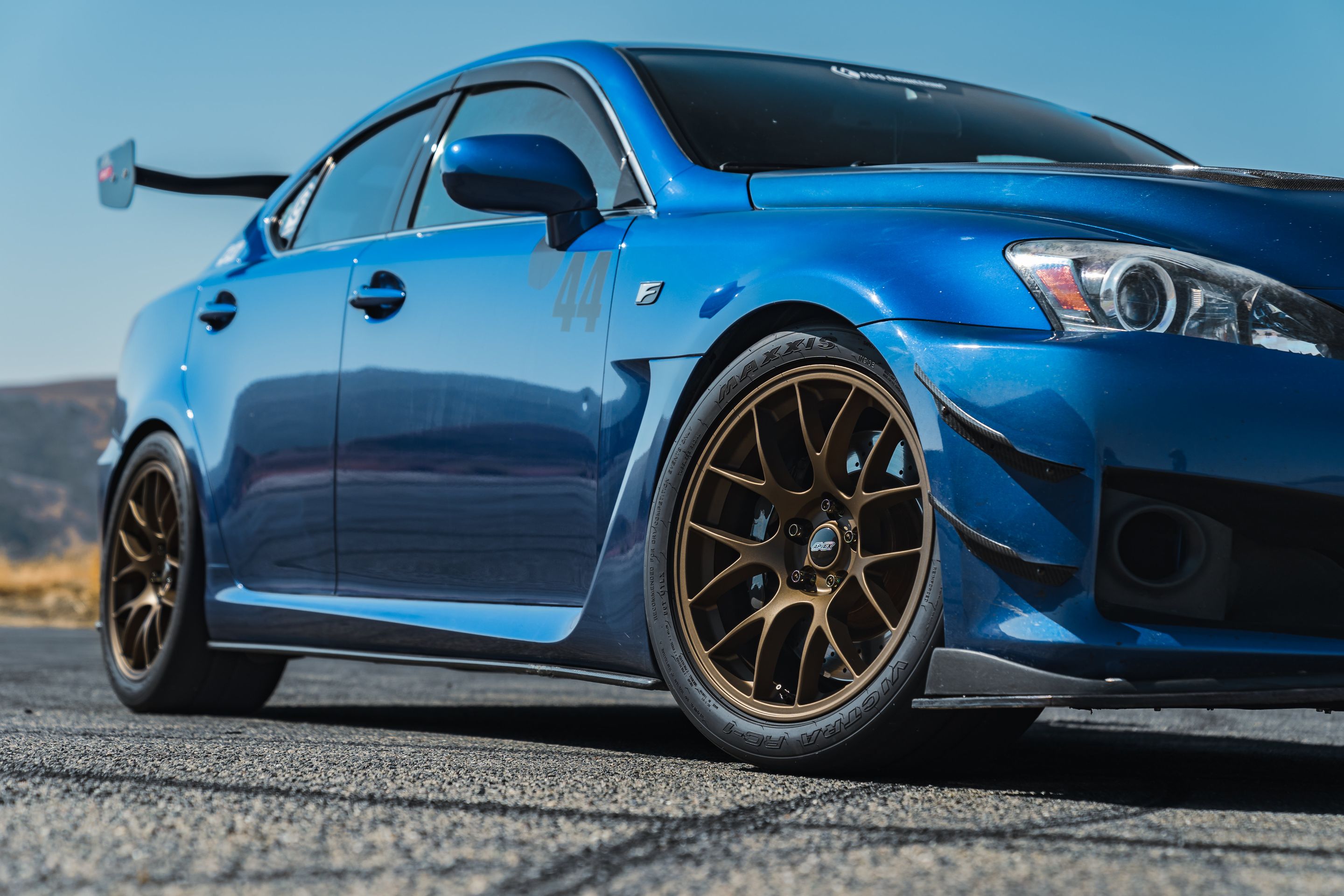 Blue Lexus USE20 IS-F with 18" EC-7 Apex wheels in Satin Bronze