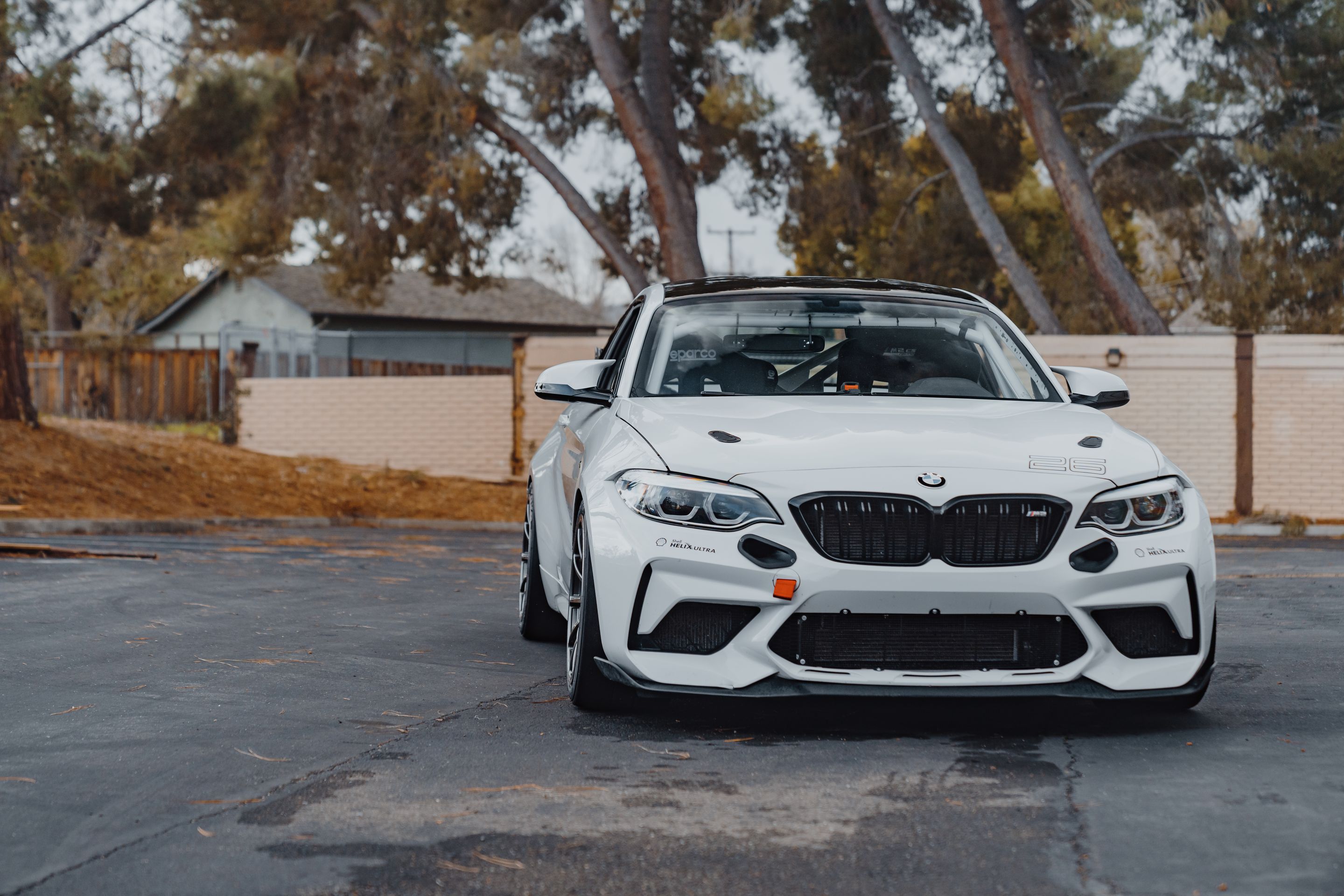 White BMW F87 M2 with 18" SM-10RE Apex wheels in Anthracite