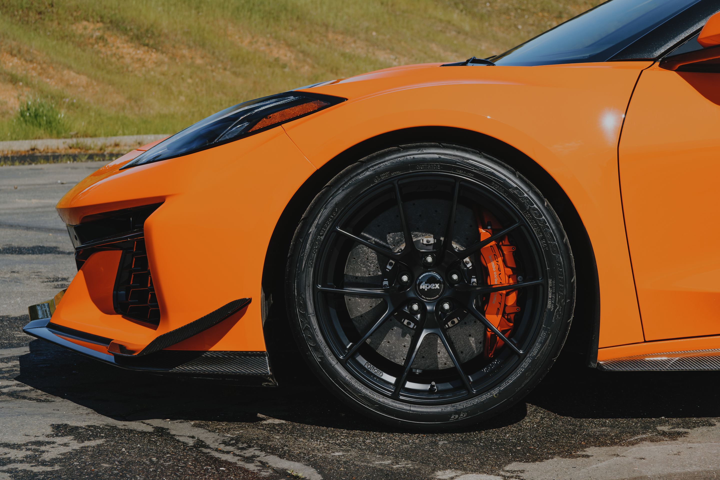 Orange Chevrolet C8 Corvette Z06 with 19" VS-5RS Apex wheels in Satin Black