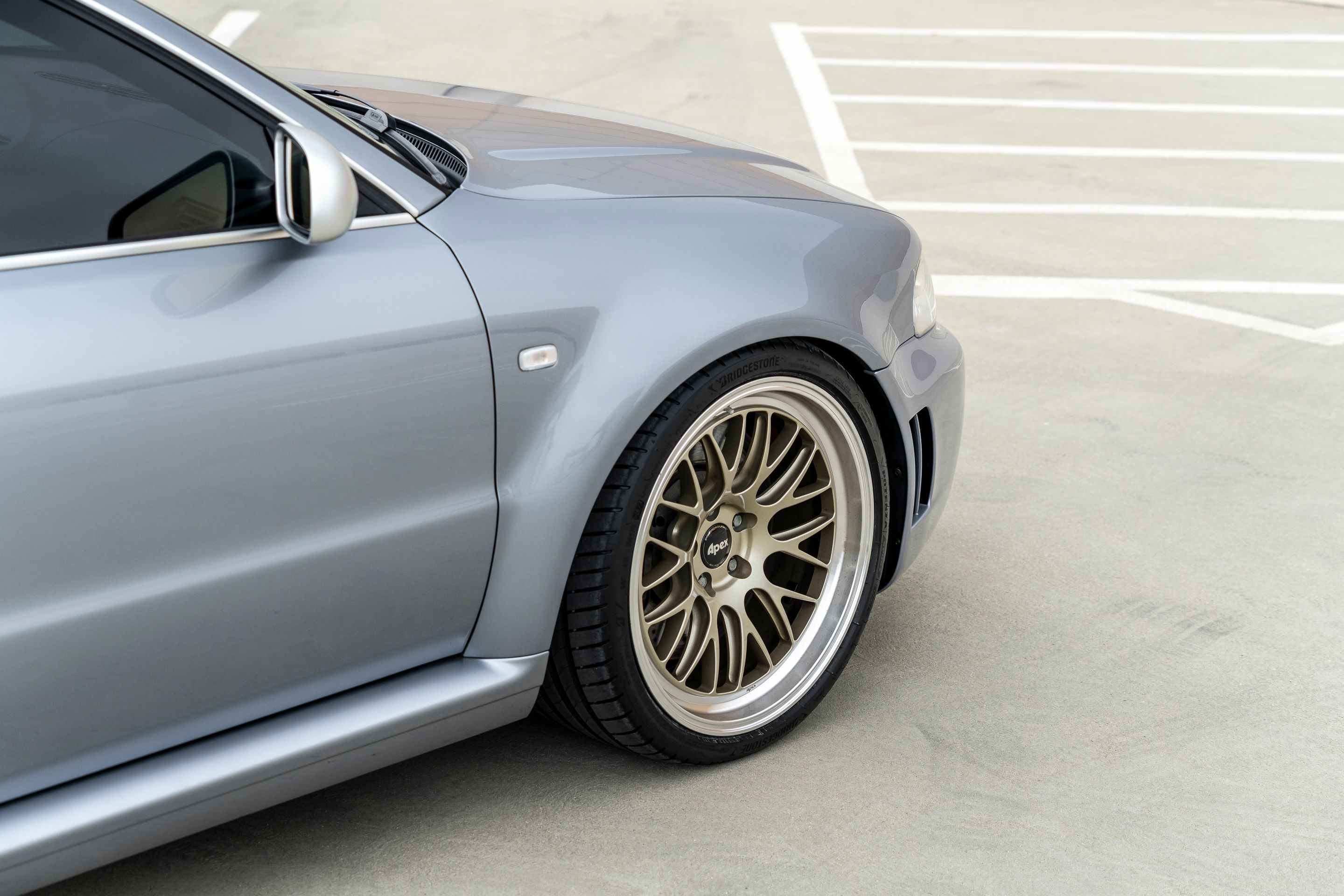 Silver Audi B5 RS 4 Avant/Wagon with 19" ML-10RT Apex wheels in Machined Lip Gloss Motorsport Gold