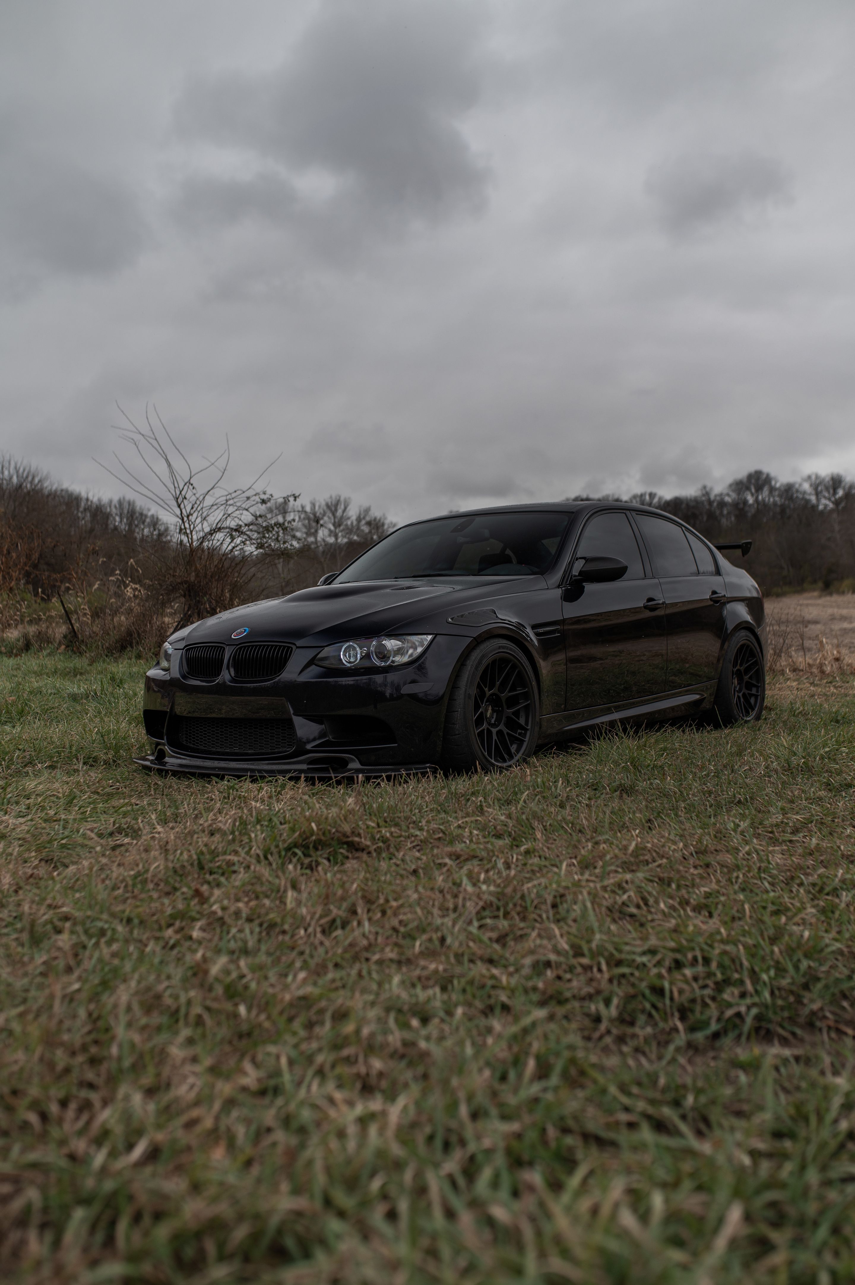 Black BMW E90 Sedan M3 with 18" ARC-8 Apex wheels in Satin Black