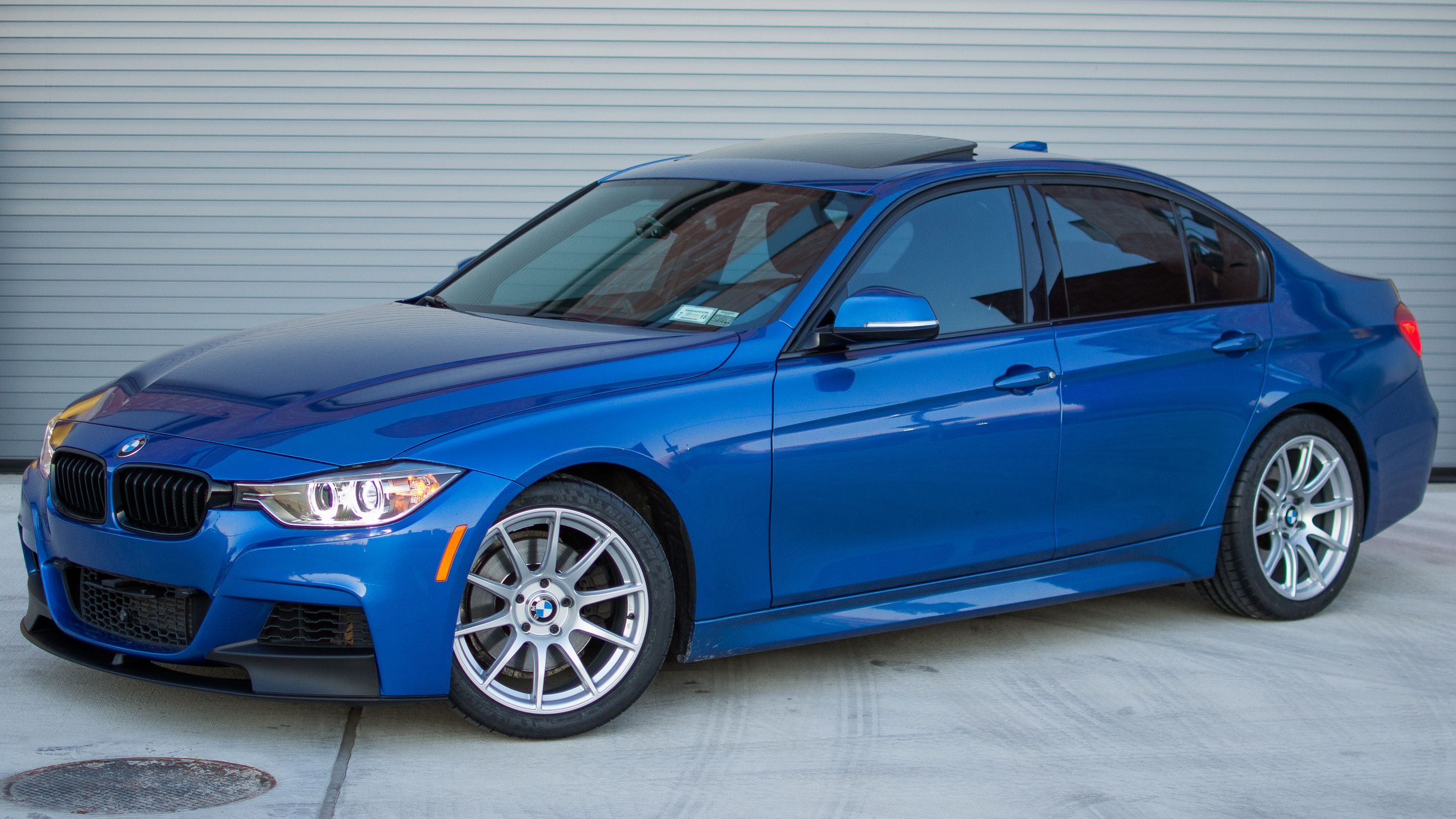 Blue BMW F30 Sedan 3 Series with 18" SM-10 Apex wheels in Race Silver
