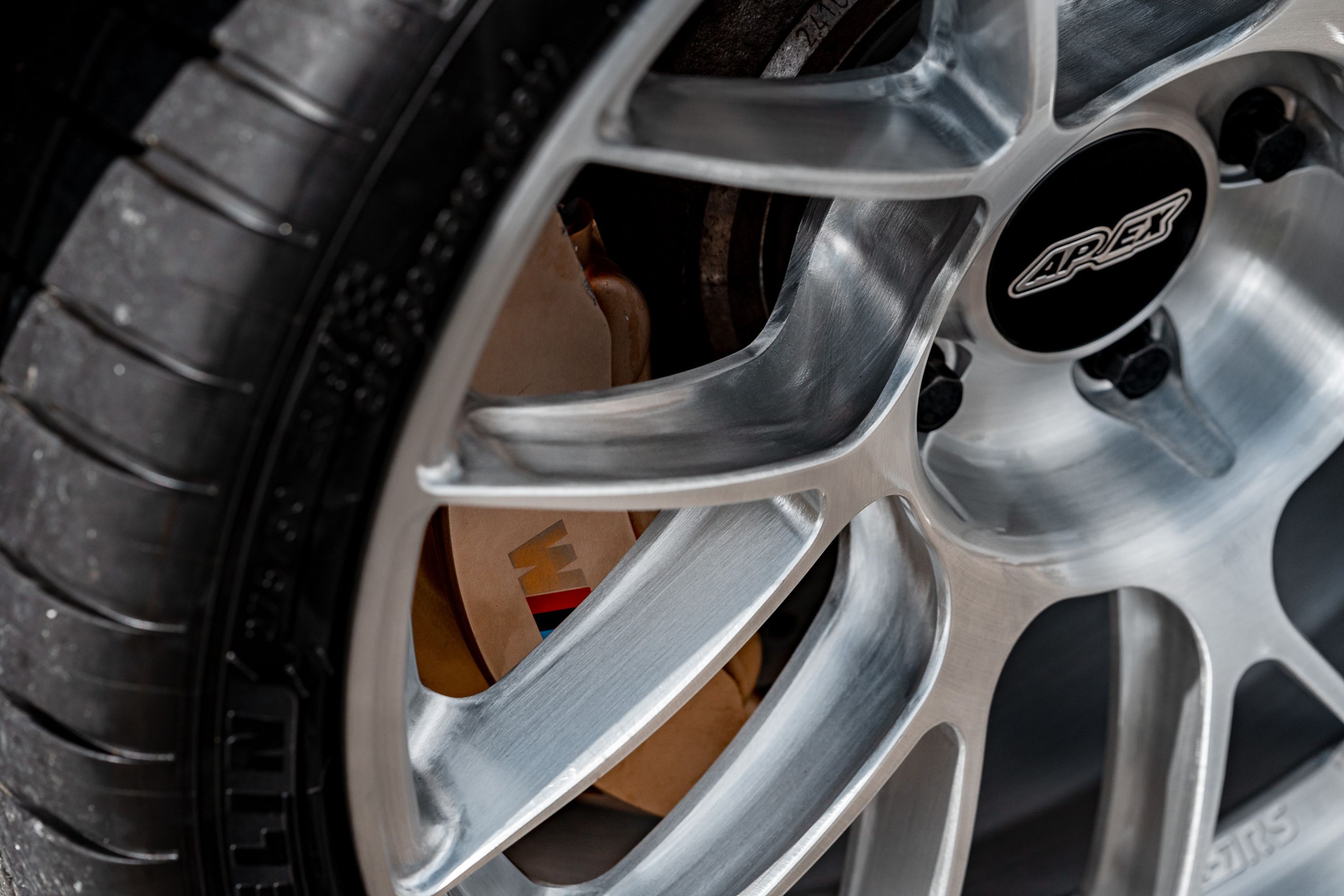 Red BMW F82 Coupe M4 with 19" EC-7RS Apex wheels in Brushed Clear