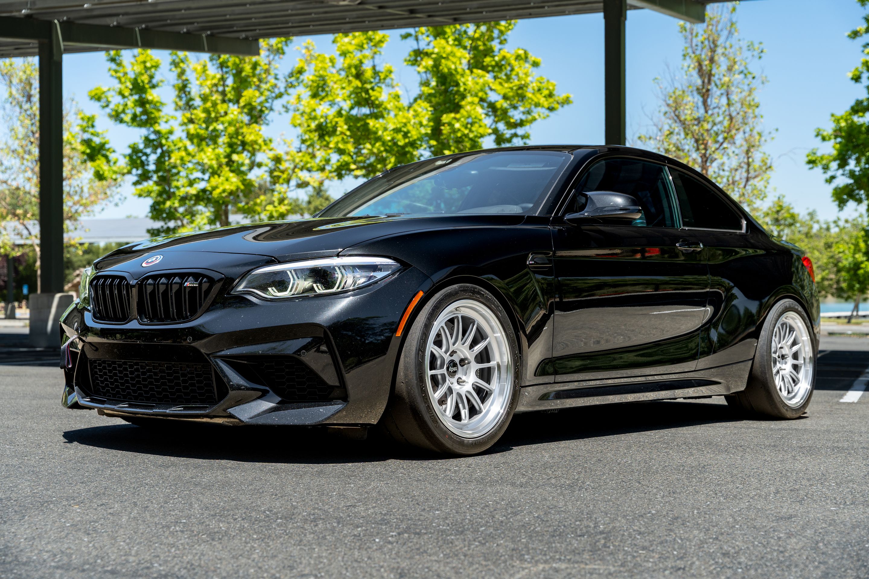 Black BMW F87 M2 with 18" SL-12RT Apex wheels in Machined Lip Race Silver