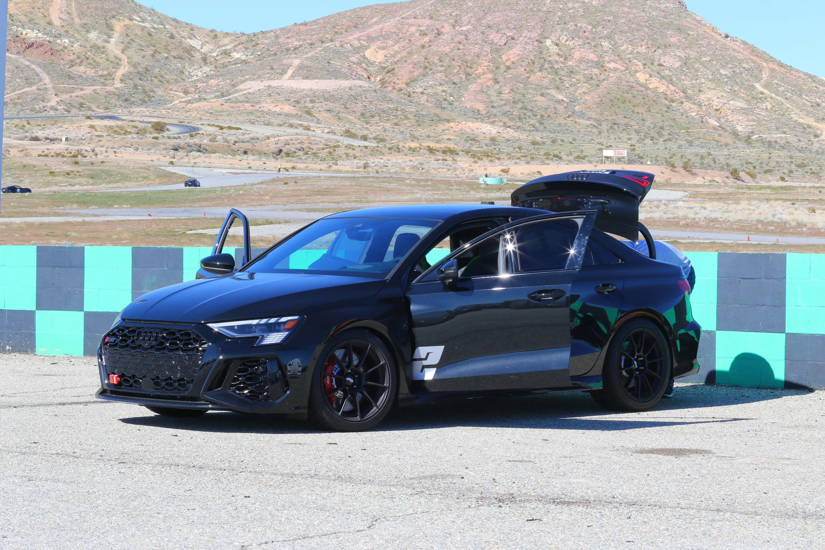 Black Audi 8Y RS 3 with 18" SM-10RS Apex wheels in Satin Black