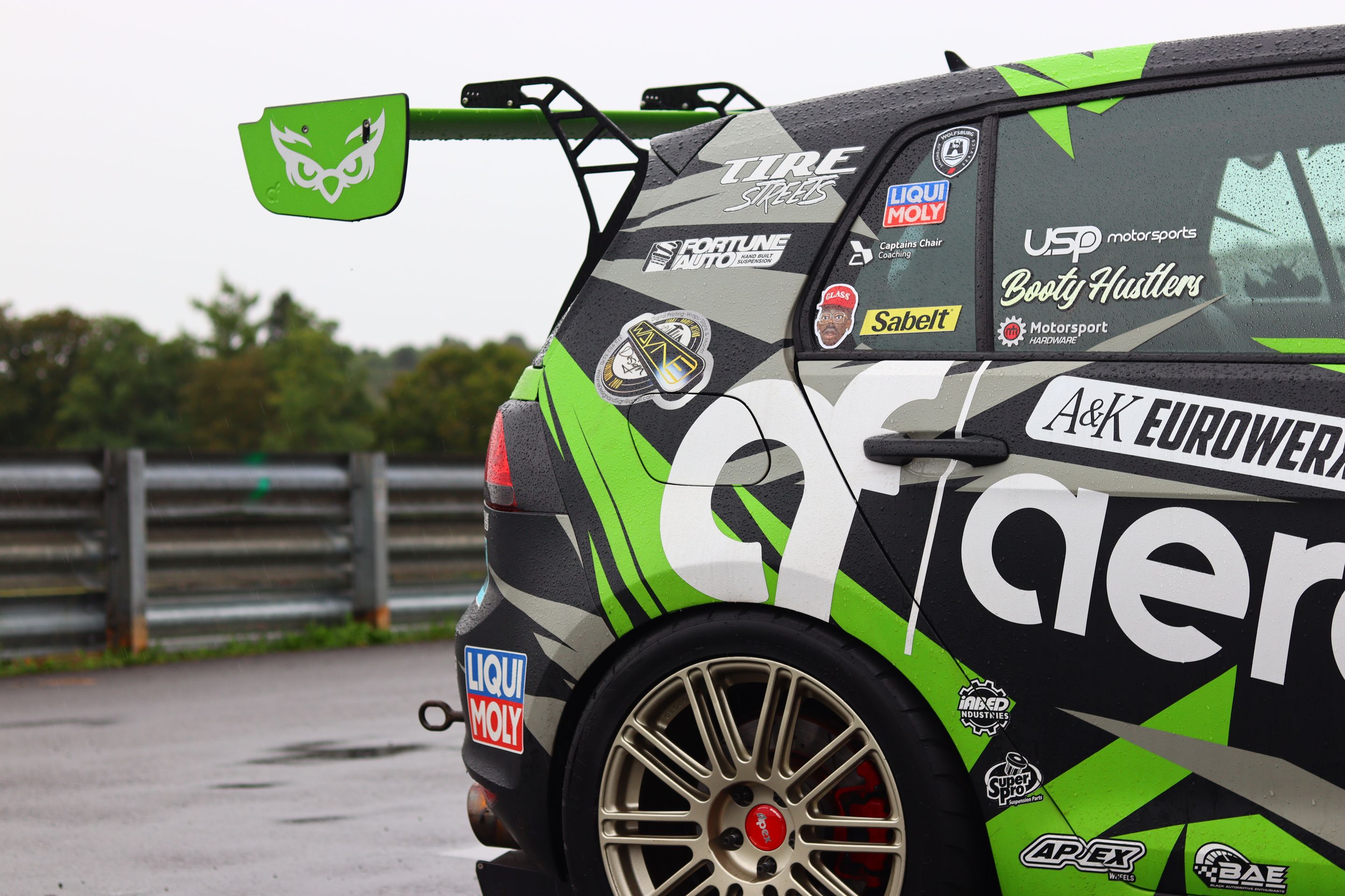 Race Livery VW MK7 GTI with 18" TC-10RT Apex wheels in Motorsport Gold