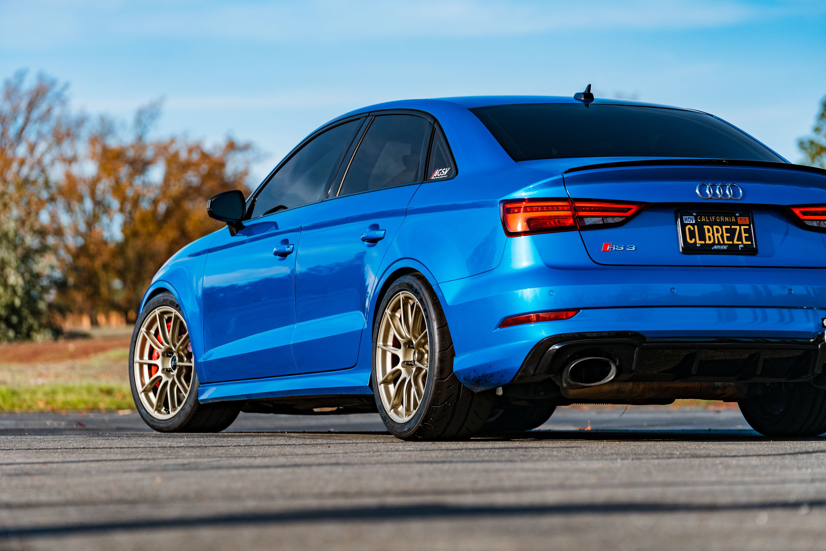 Blue Audi 8V RS 3 with 18" SM-10RS Apex wheels in Motorsport Gold