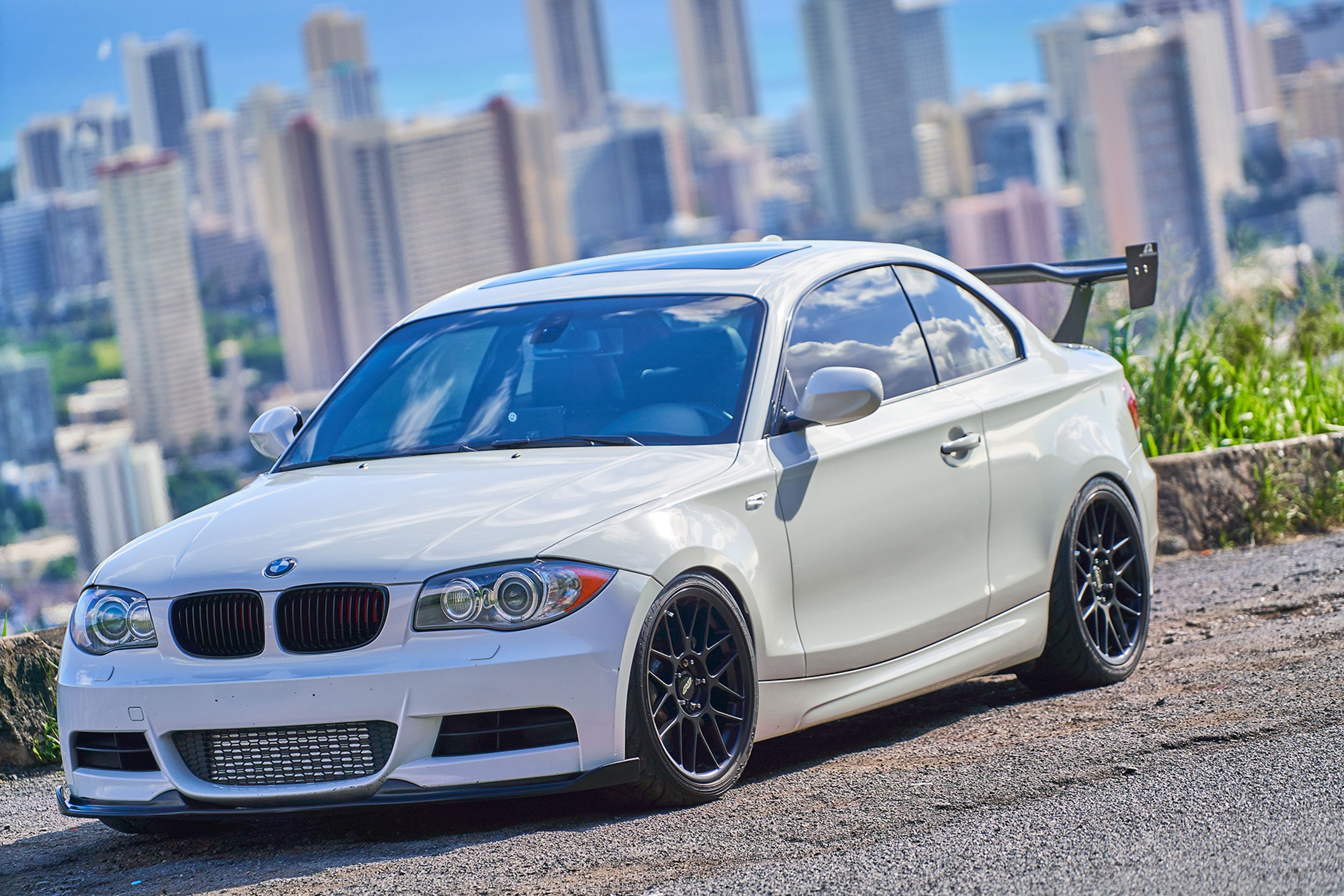 White BMW E82 Coupe 1 Series with 18" ARC-8 Apex wheels in Satin Black