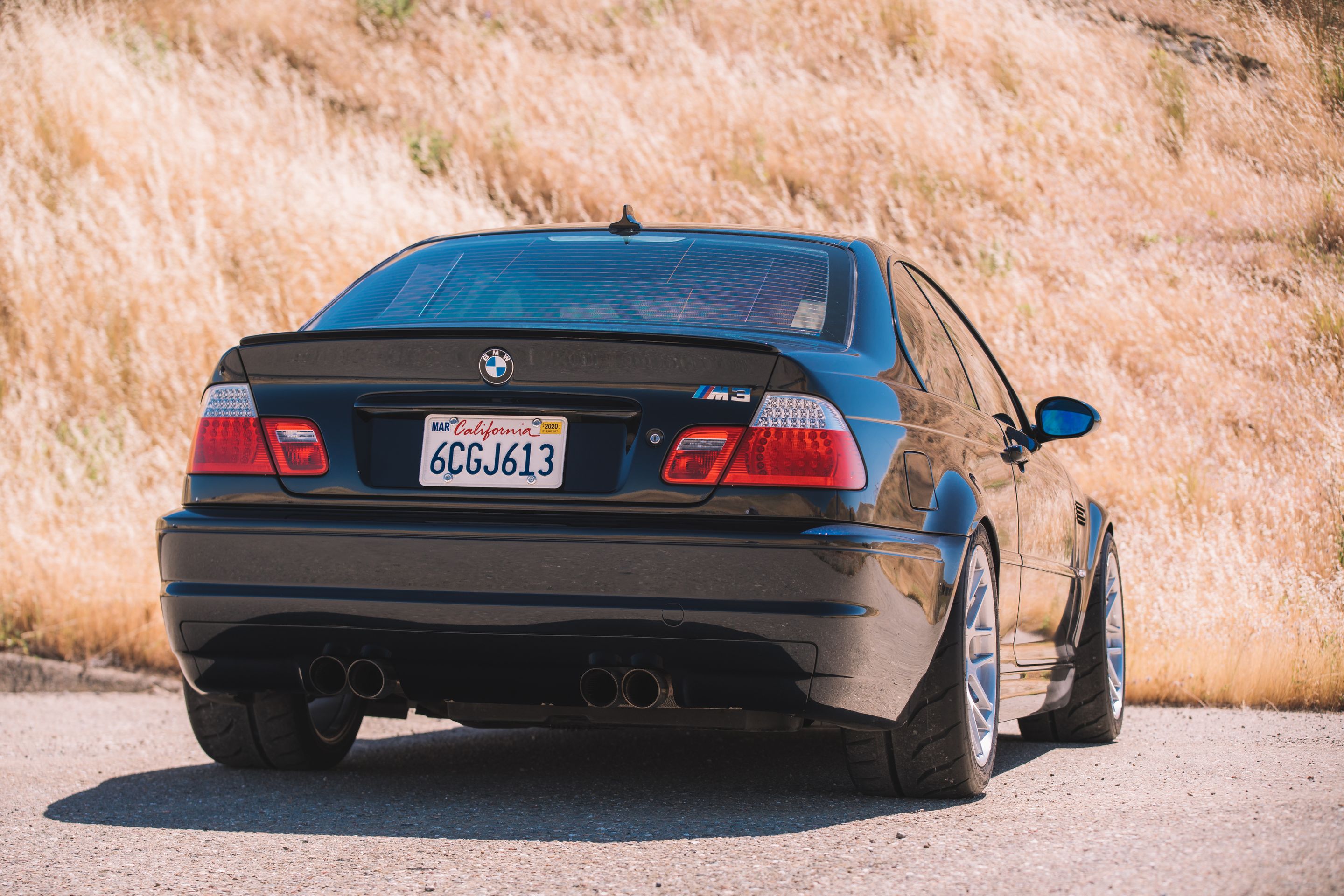 Black BMW E46 M3 with 18" ARC-8R Apex wheels in Brushed Clear