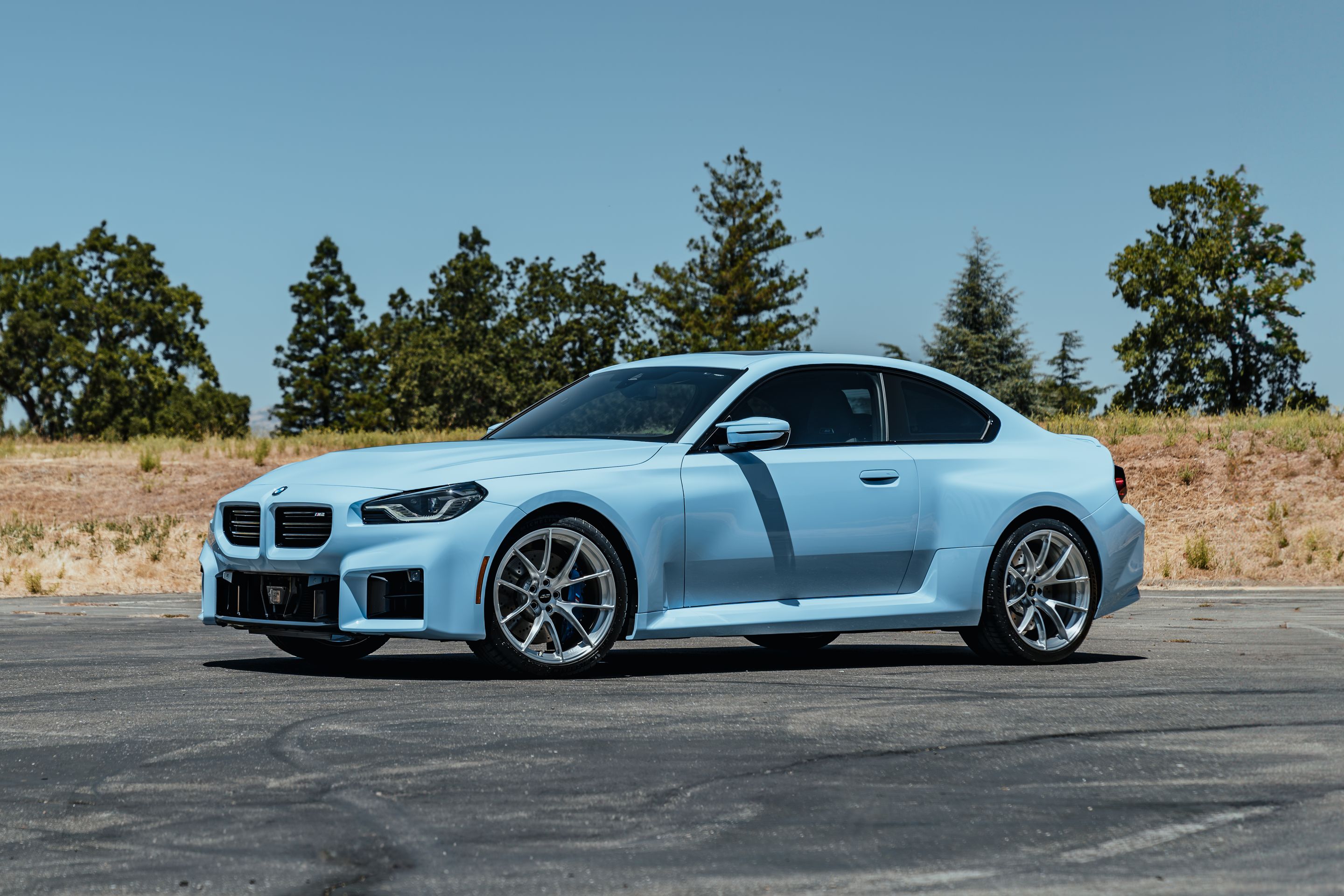 Blue BMW G87 M2 with 20" VS-5RS Apex wheels in Brushed Clear