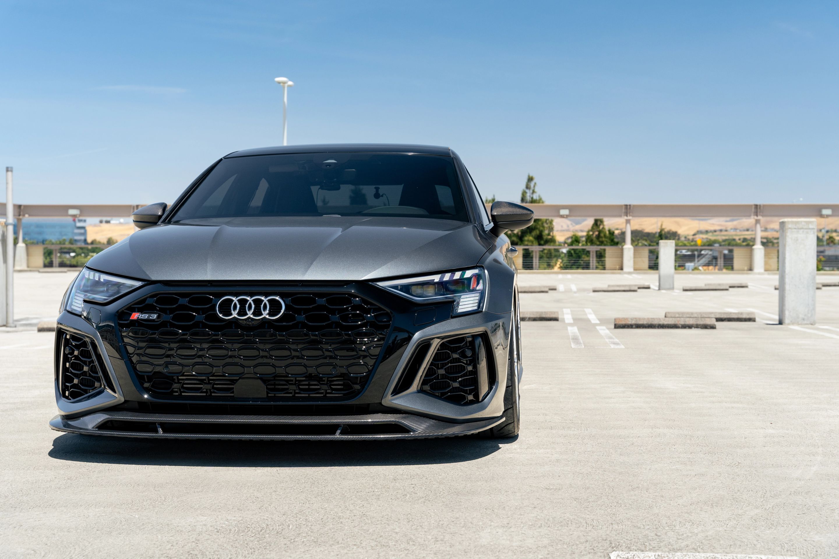 Grey Audi 8Y RS 3 with 18" TC-10RT Apex wheels in Race Silver