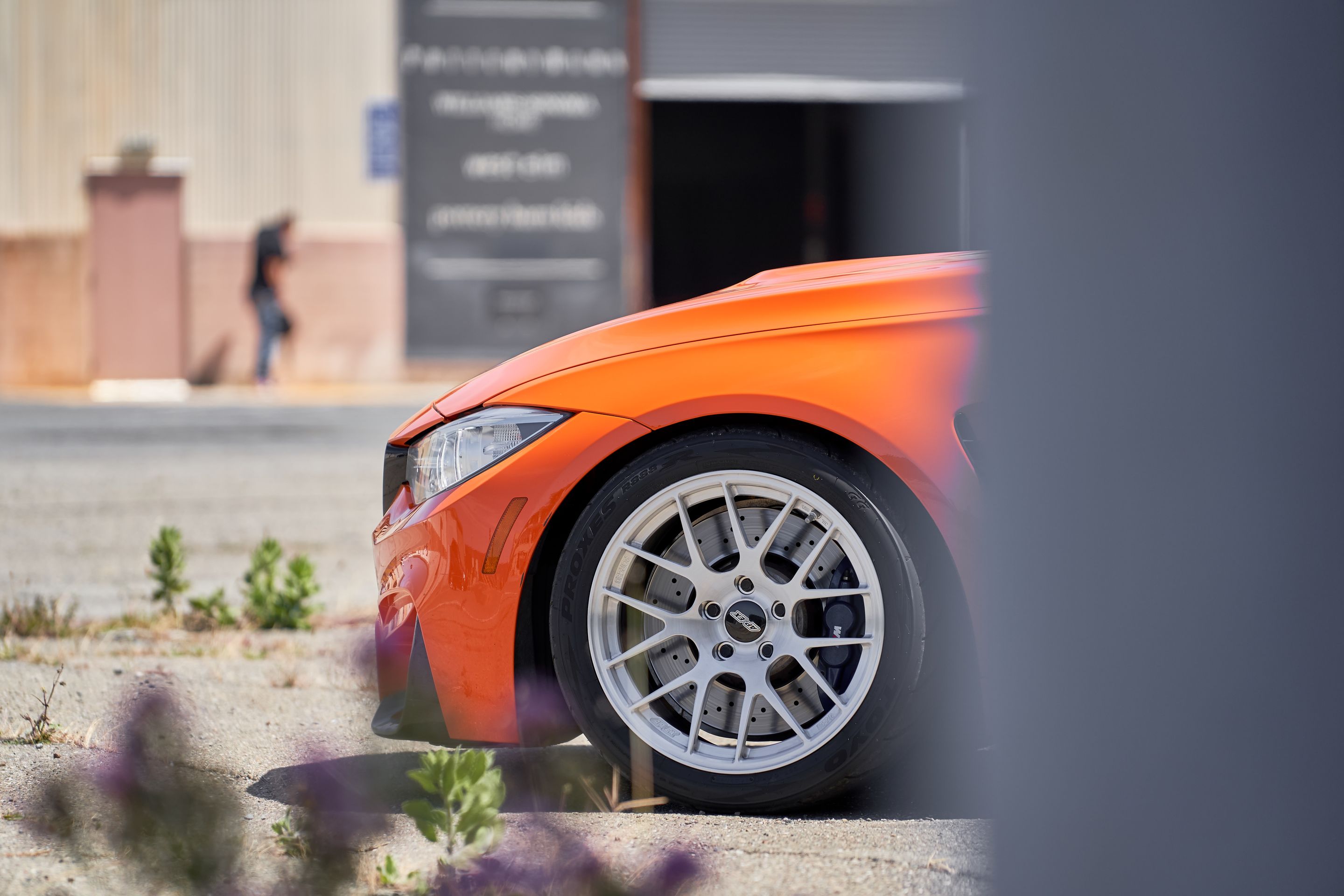 Orange BMW F80 M3 with 18" EC-7R Apex wheels in Brushed Clear