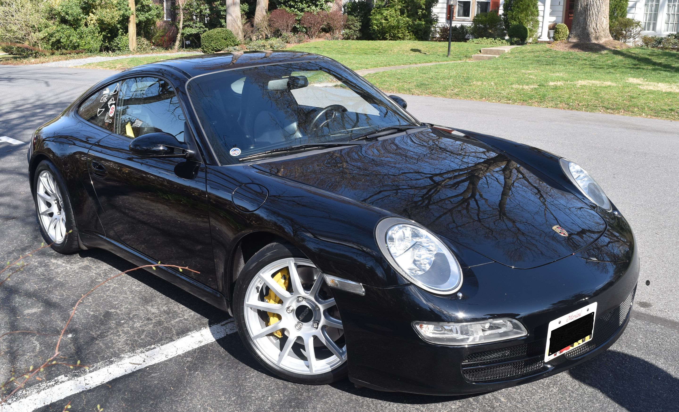 Black Porsche 911 997 Carrera S with 18" SM-10 Apex wheels in Race Silver
