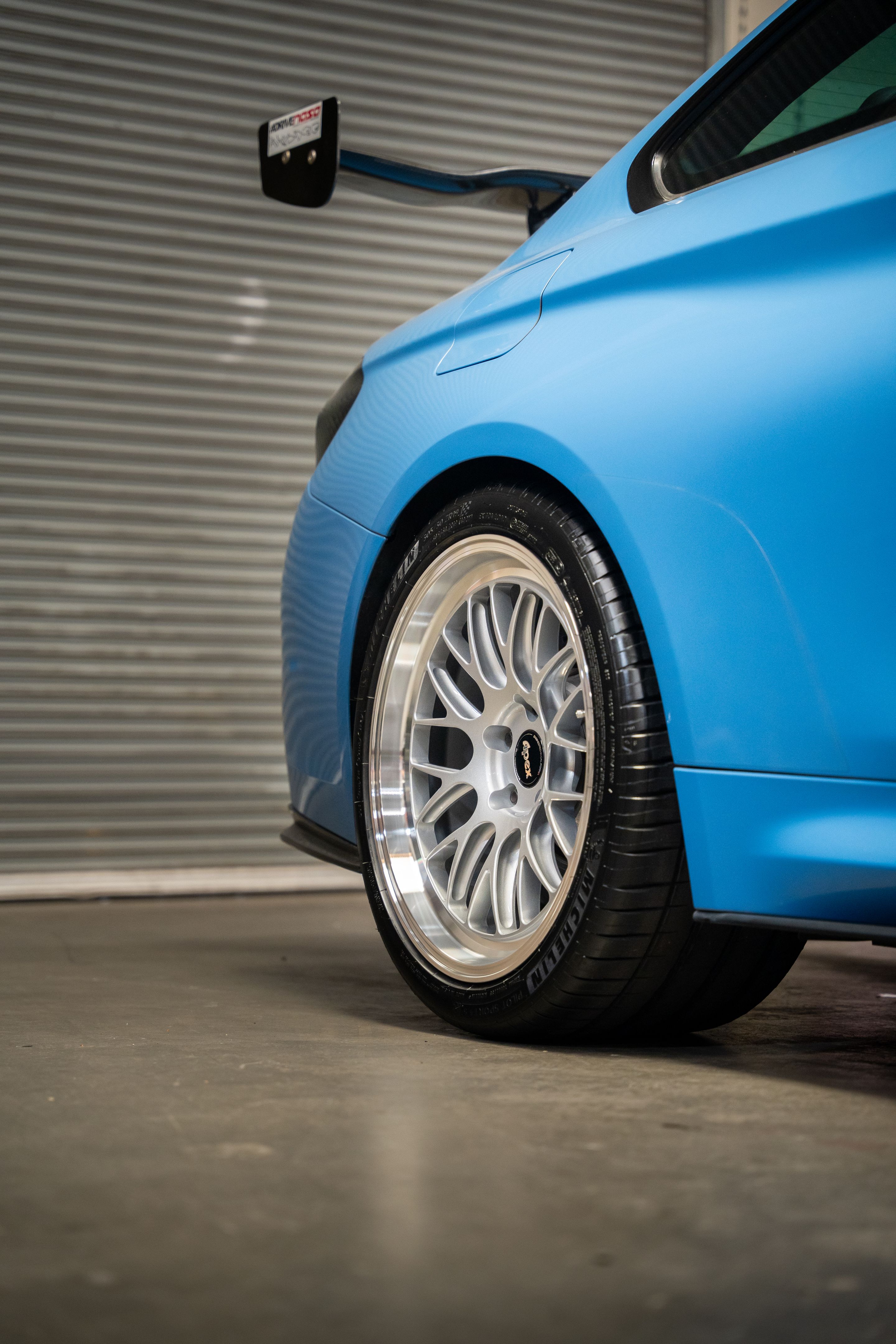 Blue BMW F82 Coupe M4 with 19" ML-10RT Apex wheels in Machined Lip Race Silver