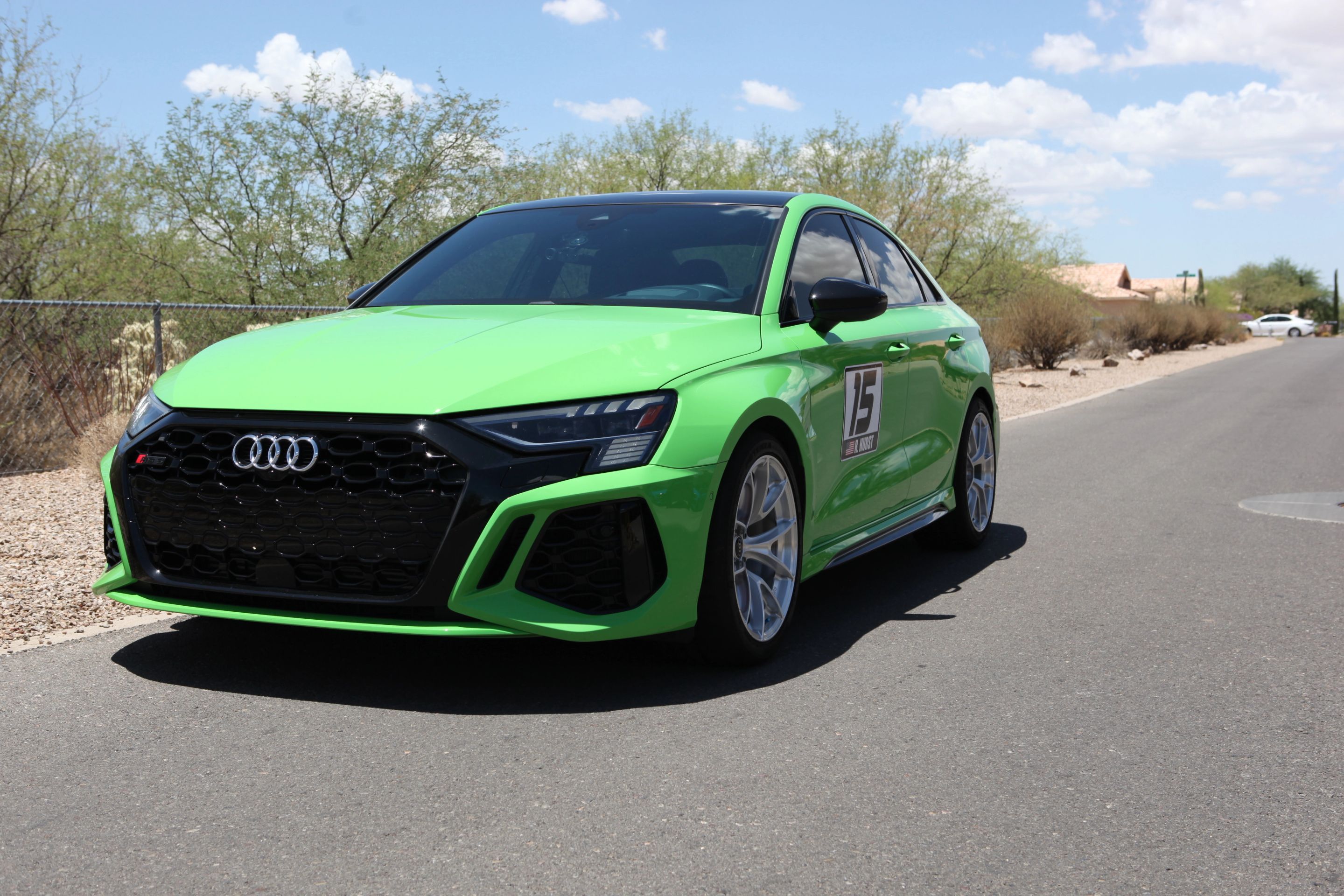 Green Audi 8Y RS 3 with 18" VS-5RS Apex wheels in Brushed Clear